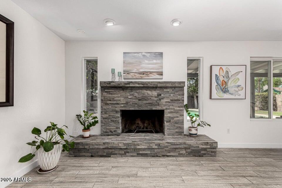 4909 East Waltann Lane Scottsdale, AZ 85254 - Photo 10 of 34 a living room with furniture and a fireplace
