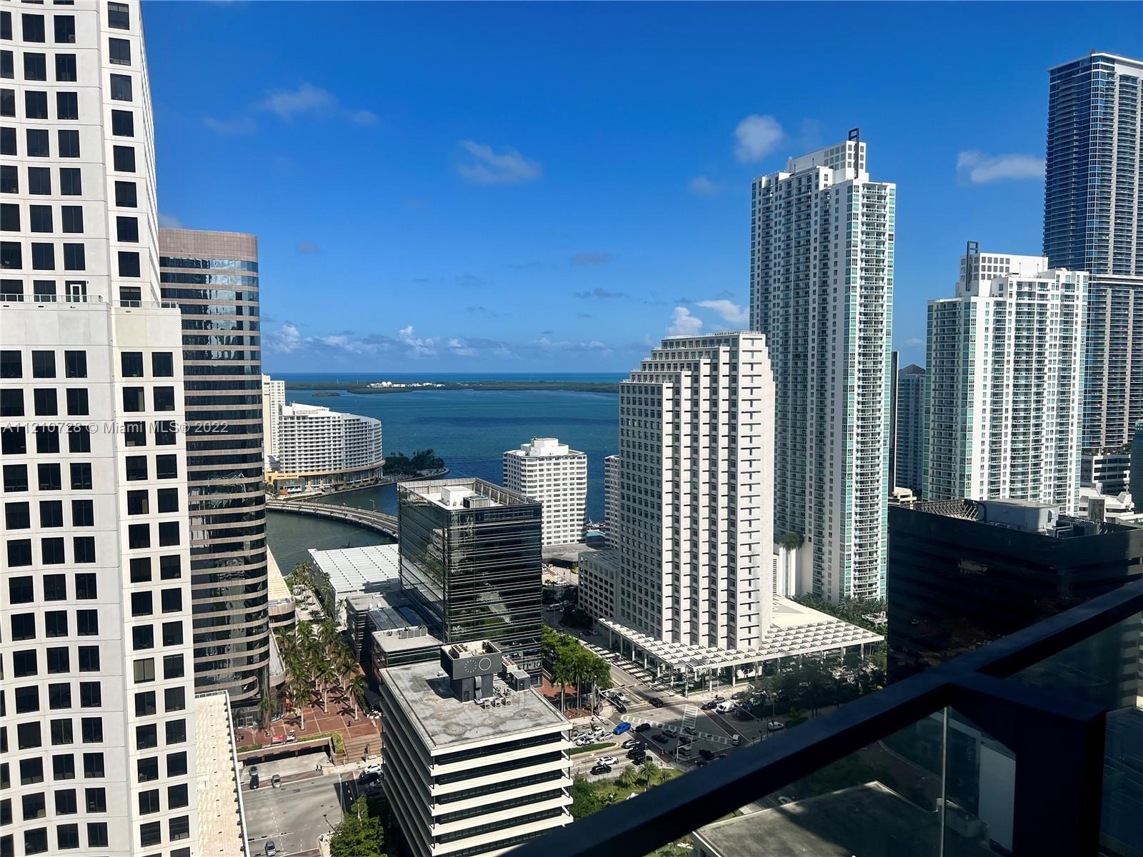 68 Southeast 6th Street, Unit 2801 Miami, FL 33131 - Photo 2 of 40 a view of balcony with wooden floor