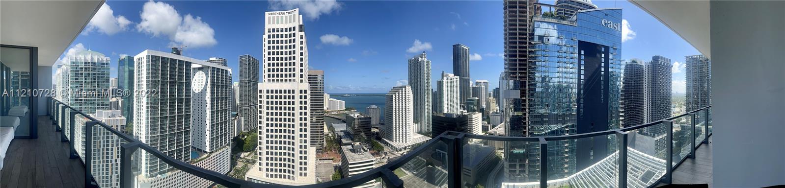 68 Southeast 6th Street, Unit 2801 Miami, FL 33131 - Photo 3 of 40 a view of a city view from a balcony