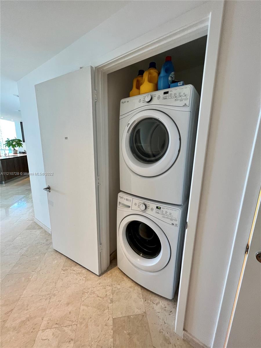 68 Southeast 6th Street, Unit 2801 Miami, FL 33131 - Photo 32 of 40 a utility room with dryer and washer