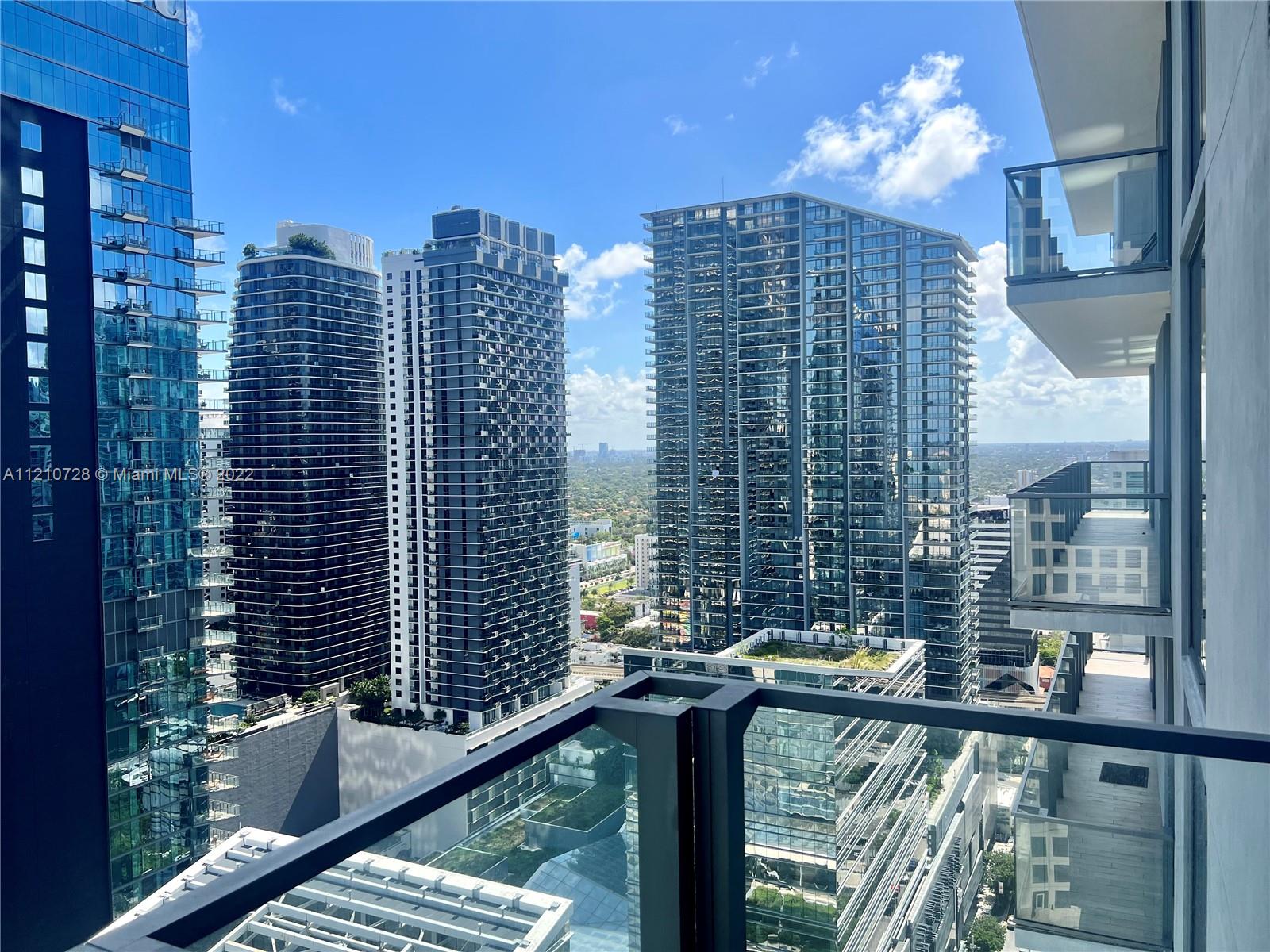 68 Southeast 6th Street, Unit 2801 Miami, FL 33131 - Photo 9 of 40 a view of a balcony with city view