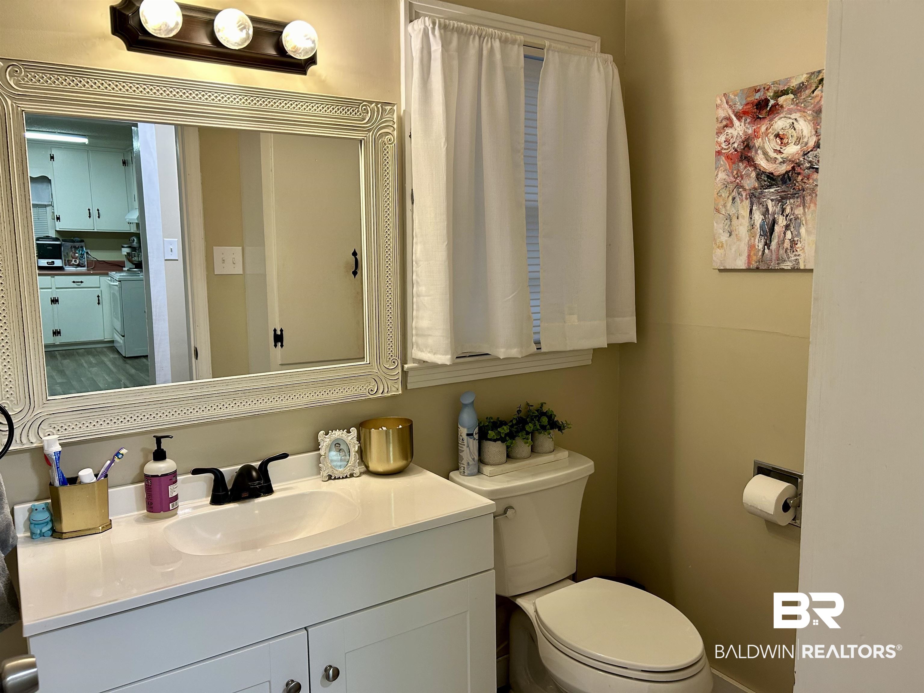 3850 Newman Road Mobile, AL 36695 - Photo 7 of 27 Bathroom featuring vanity and toilet