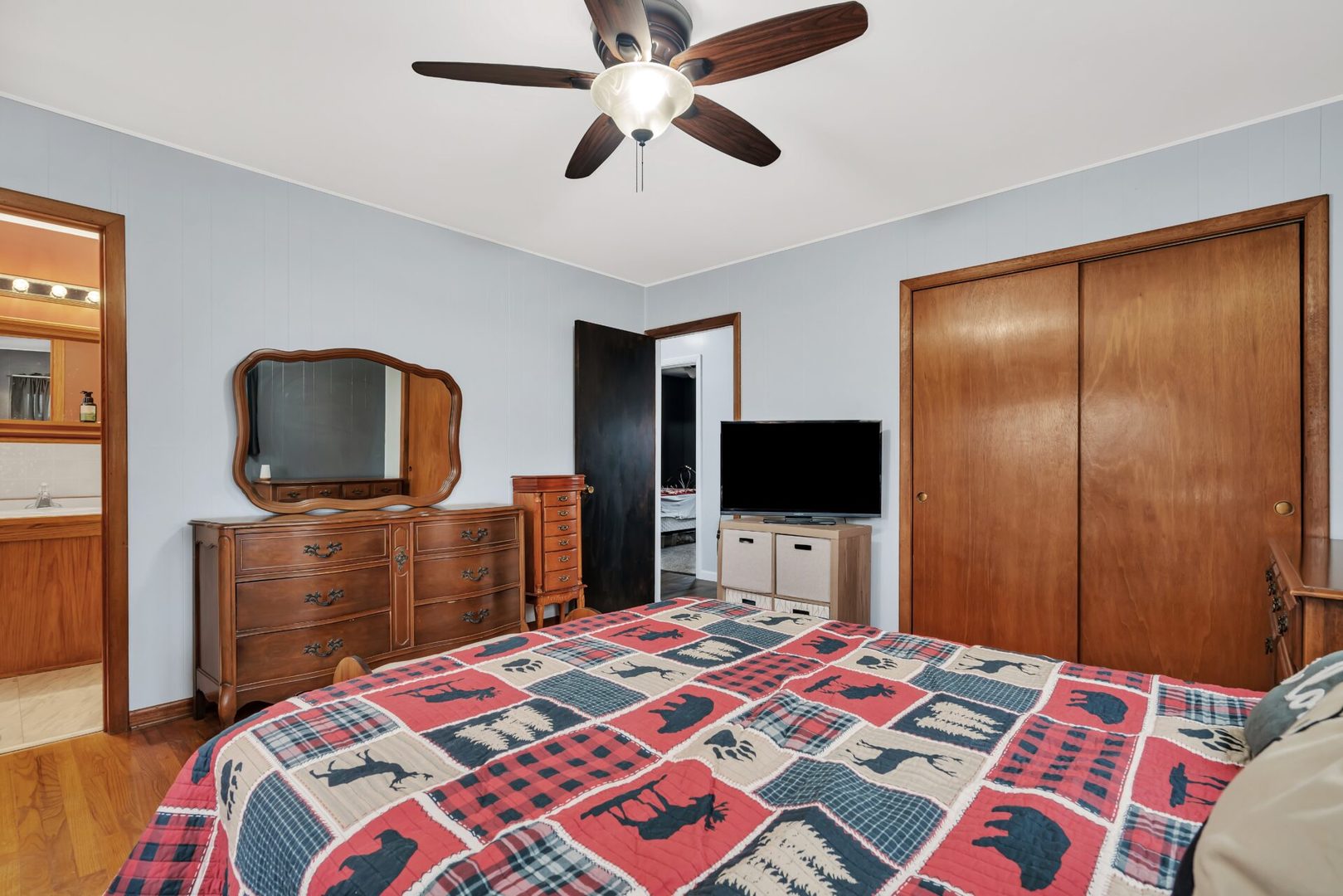 119 Davis Street Seneca, IL 61360 - Photo 14 of 21 a bedroom with a bed and a flat screen tv