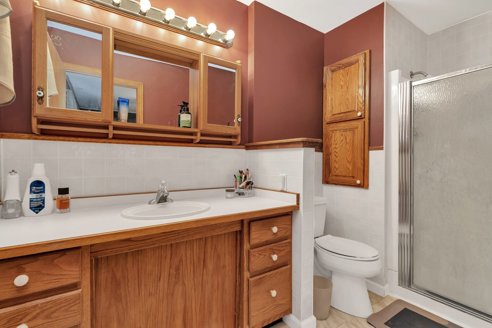 119 Davis Street Seneca, IL 61360 - Photo 15 of 21 a bathroom with a sink and a toilet