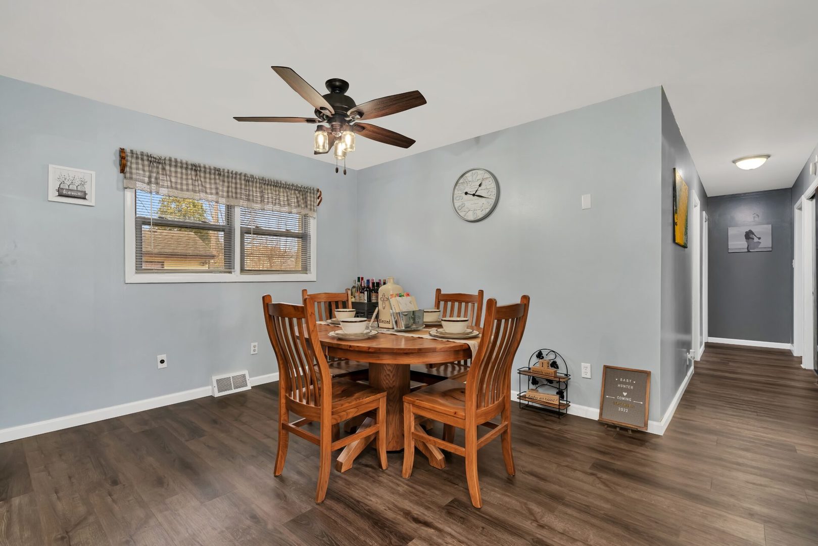 119 Davis Street Seneca, IL 61360 - Photo 18 of 21 a view of a dining room with furniture window and wooden floor