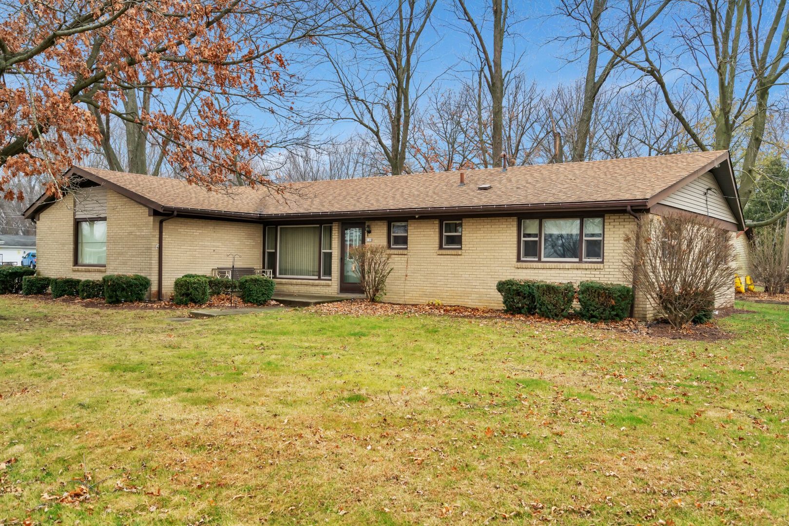119 Davis Street Seneca, IL 61360 - Photo 3 of 21 a front view of a house with a garden