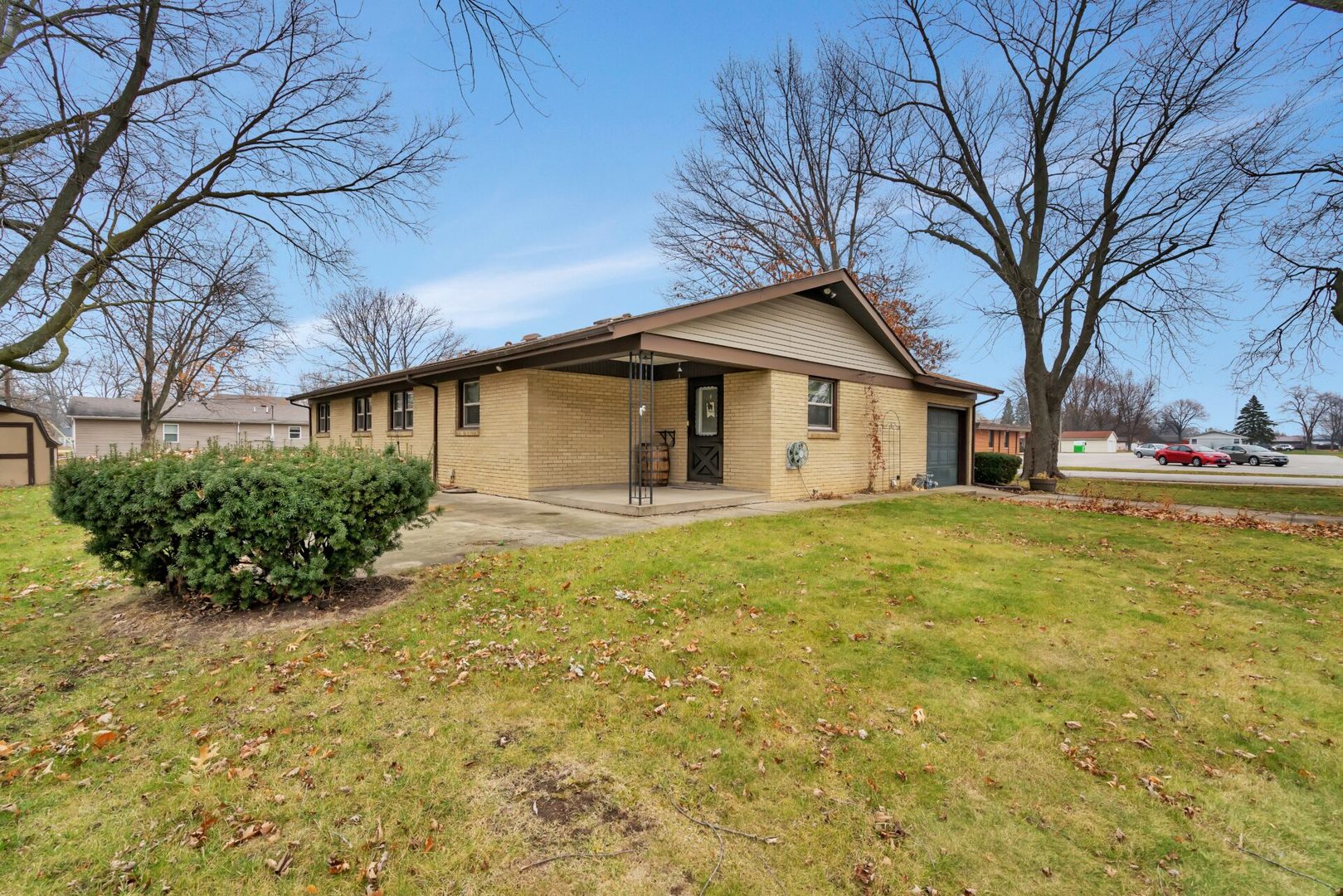 119 Davis Street Seneca, IL 61360 - Photo 5 of 21 a front view of house with yard and green space