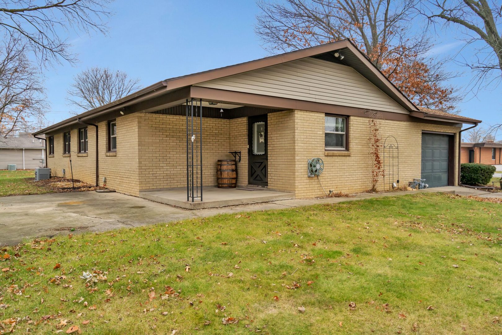 119 Davis Street Seneca, IL 61360 - Photo 6 of 21 a view of a white house with a yard