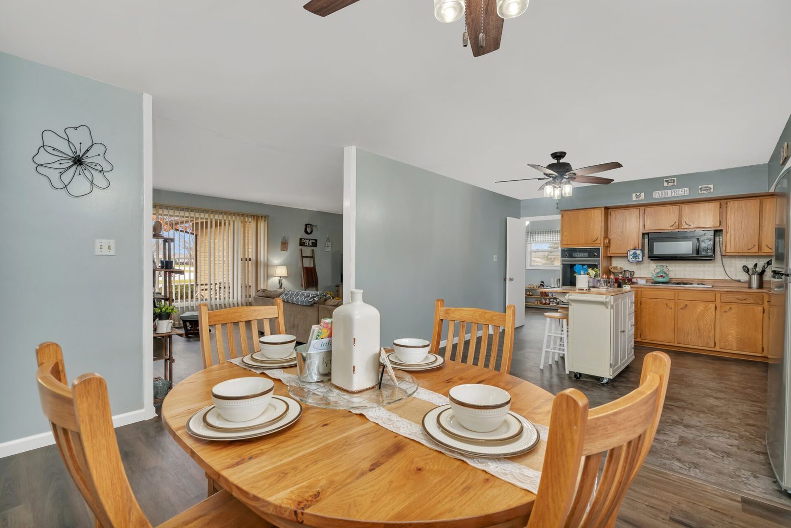 119 Davis Street Seneca, IL 61360 - Photo 7 of 21 a dining room with furniture and wooden floor