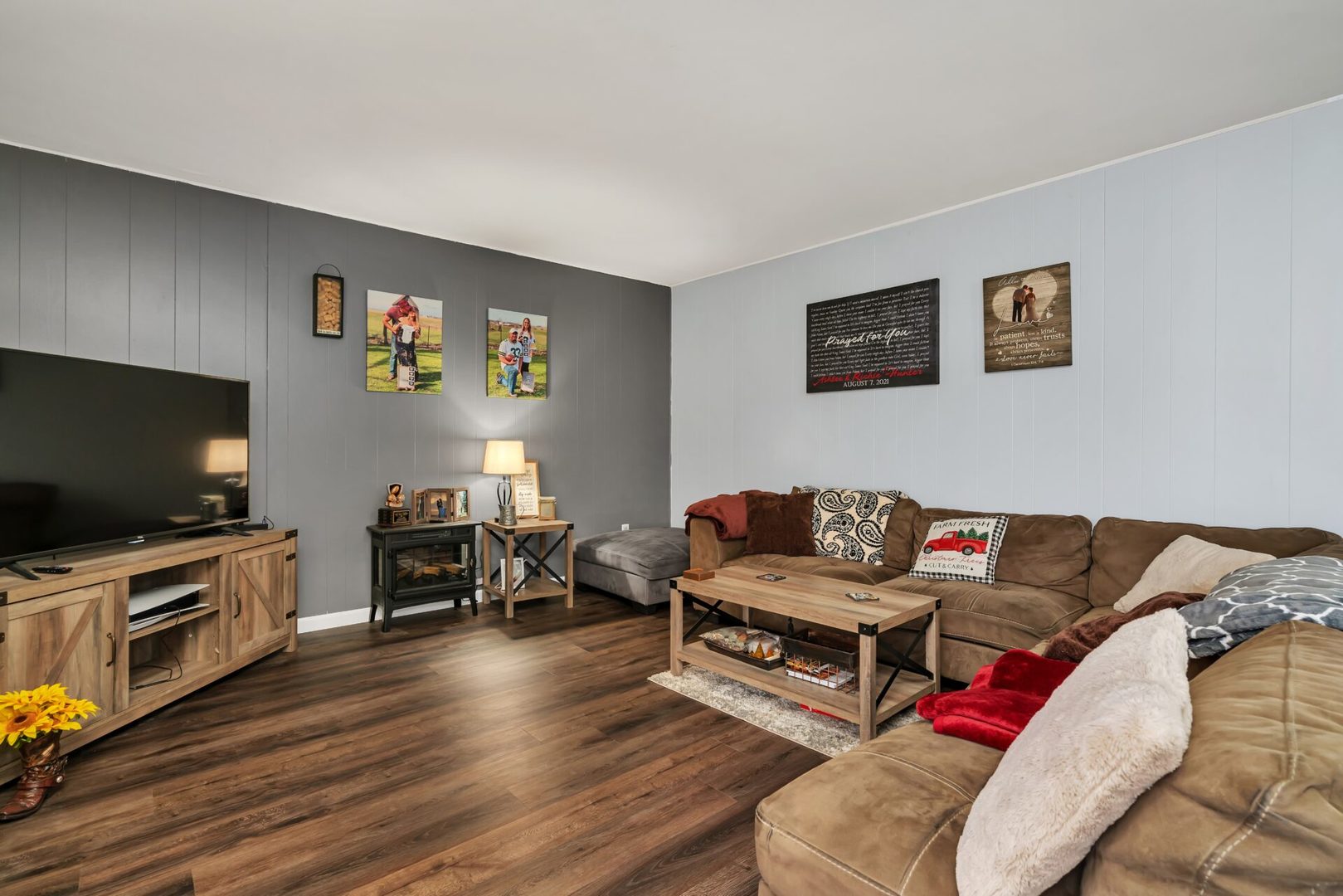 119 Davis Street Seneca, IL 61360 - Photo 10 of 21 a living room with furniture and a flat screen tv