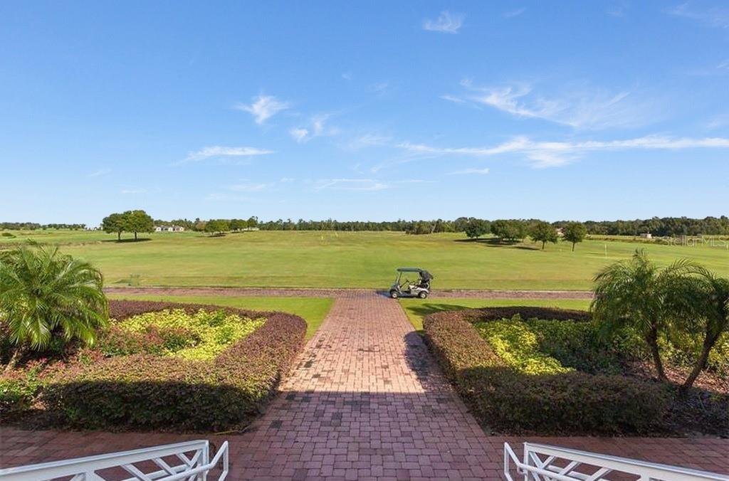 4111 Eastminster Road Davenport, FL 33837 - Photo 18 of 18 a view of a lake with a outdoor space