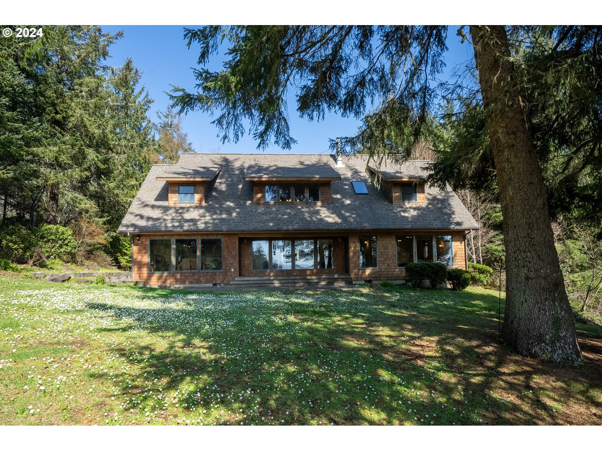 a view of a house with a garden