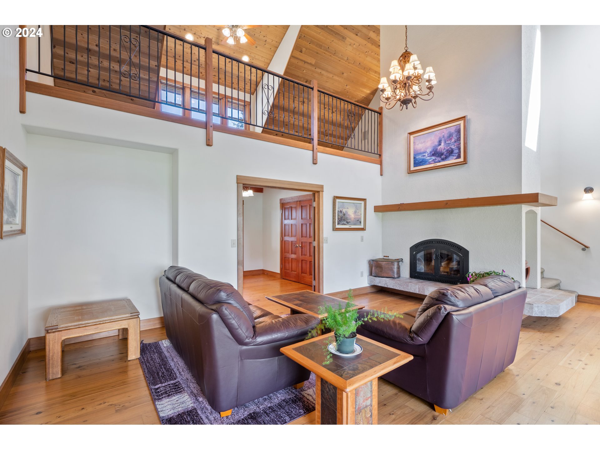 2705 Netarts Bay Drive Netarts, OR 97141 - Photo 11 of 48 a living room with furniture and a fireplace
