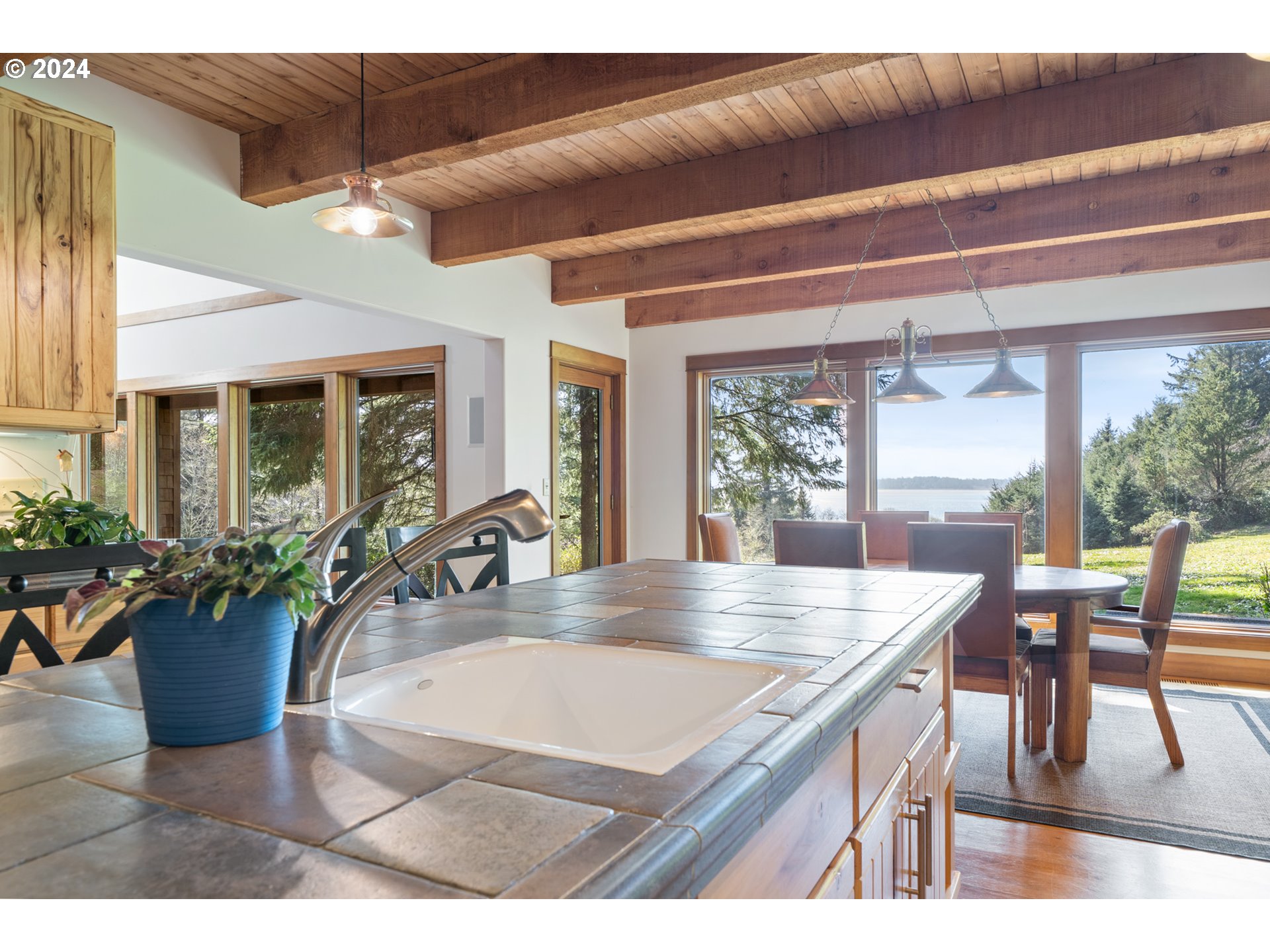 2705 Netarts Bay Drive Netarts, OR 97141 - Photo 17 of 48 a view of a dining room with furniture window and outside view