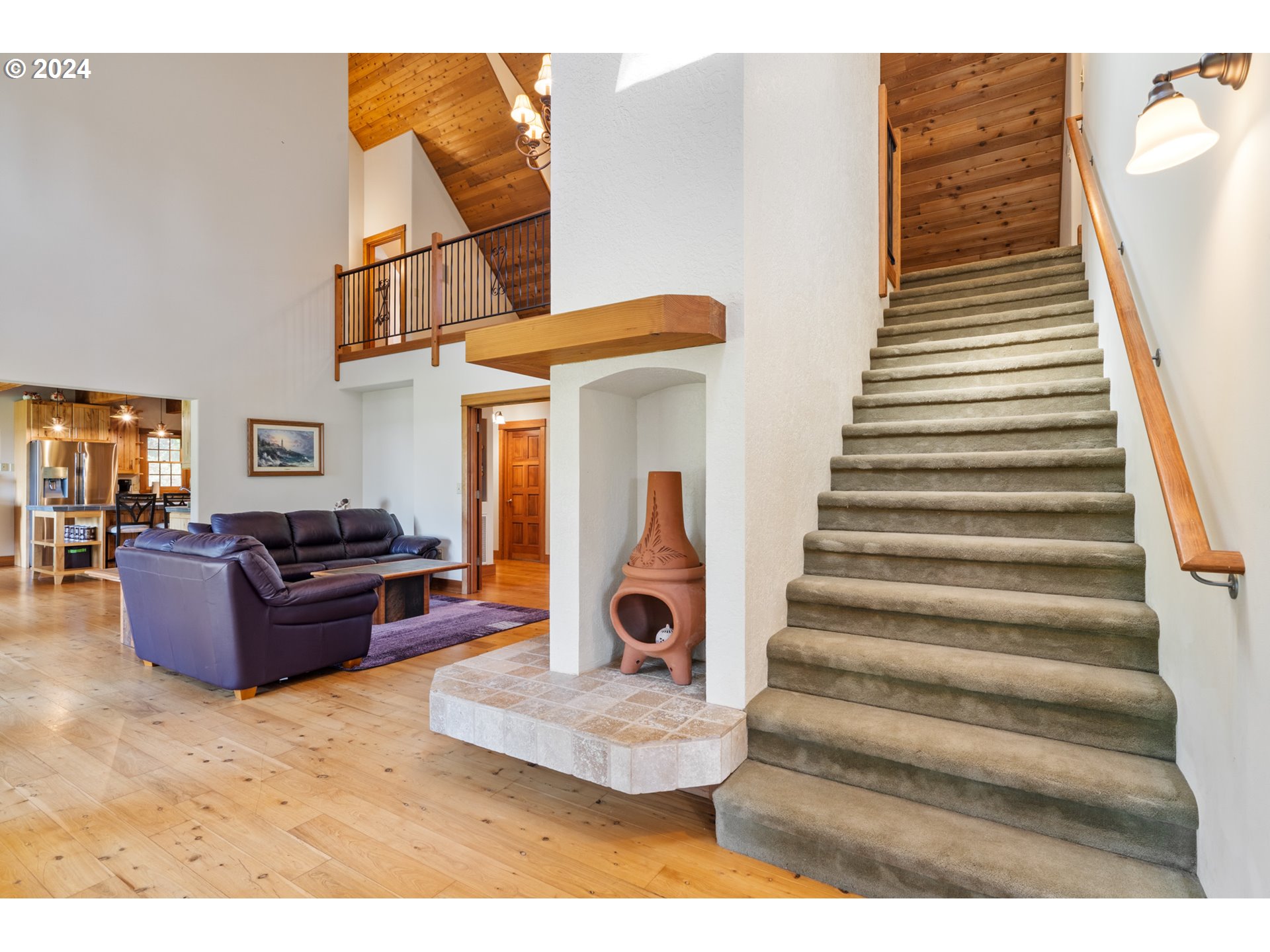2705 Netarts Bay Drive Netarts, OR 97141 - Photo 25 of 48 a living room with furniture and a fireplace