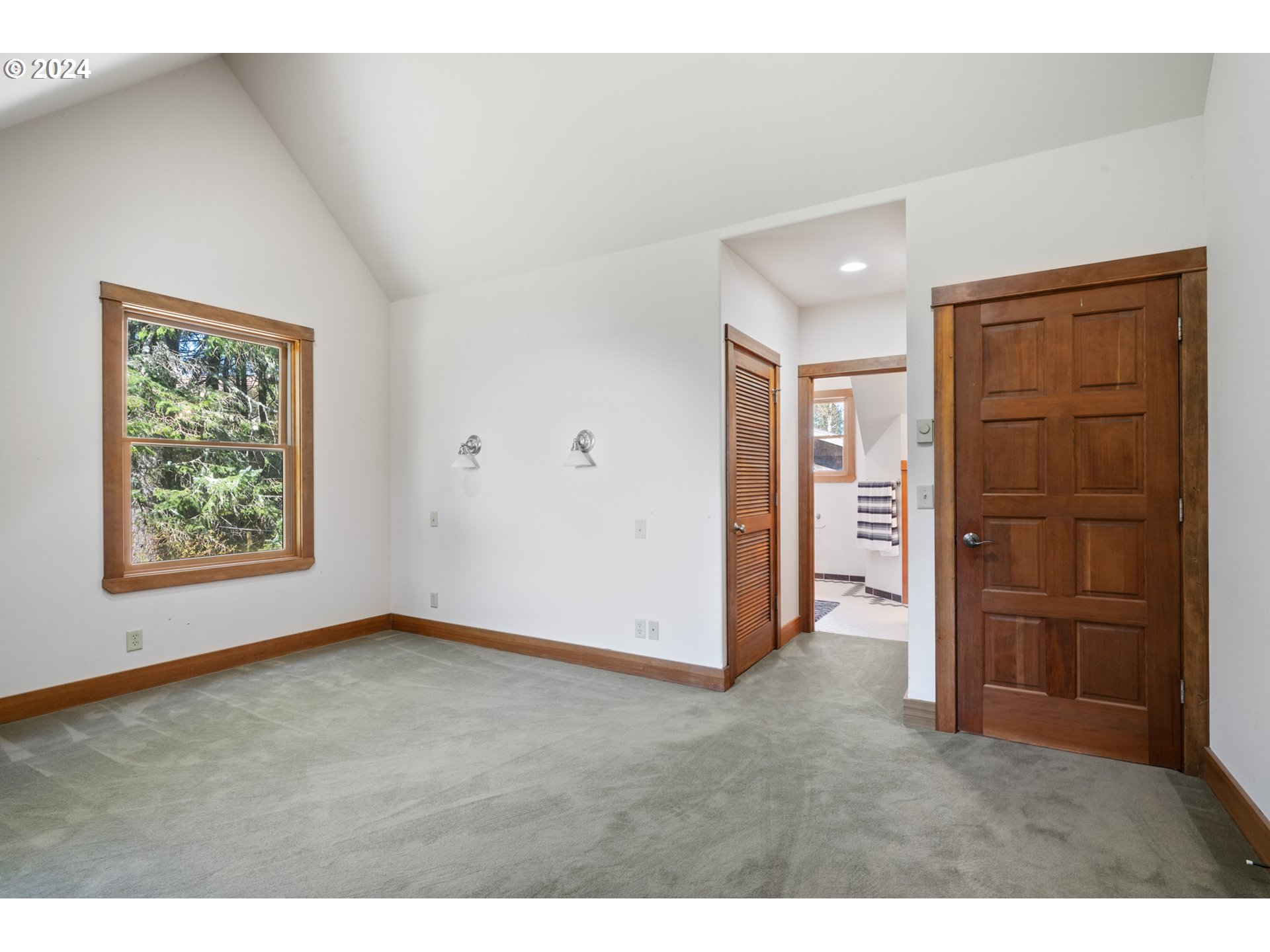 2705 Netarts Bay Drive Netarts, OR 97141 - Photo 29 of 48 a view of an empty room with closet and a window