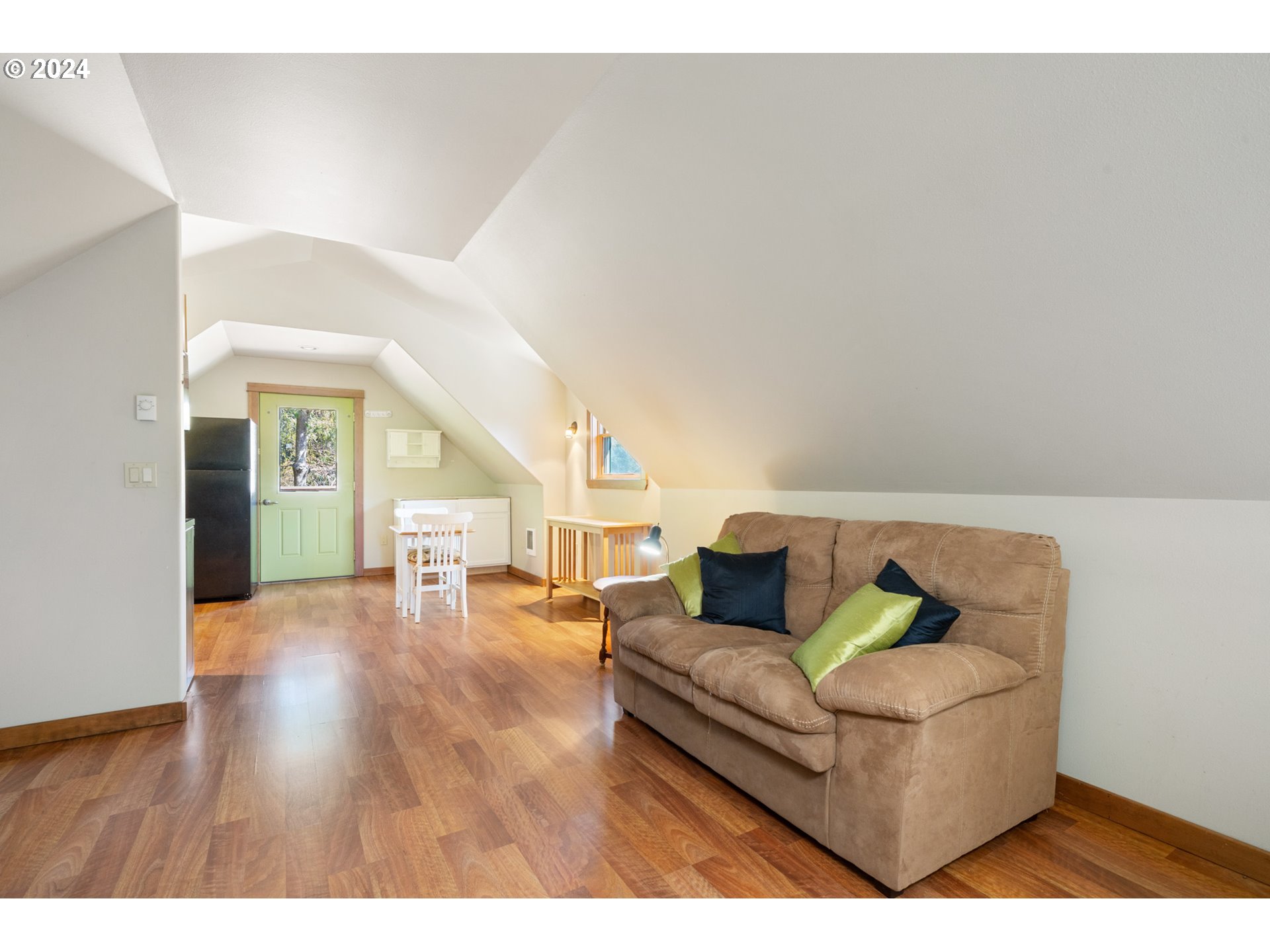 2705 Netarts Bay Drive Netarts, OR 97141 - Photo 39 of 48 a living room with furniture and a wooden floor