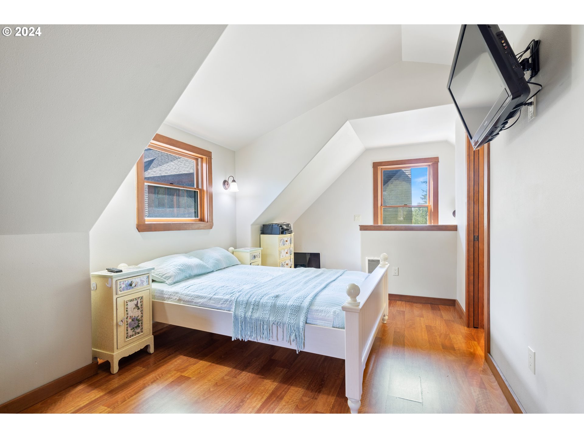 2705 Netarts Bay Drive Netarts, OR 97141 - Photo 42 of 48 a bedroom with a bed and a large window