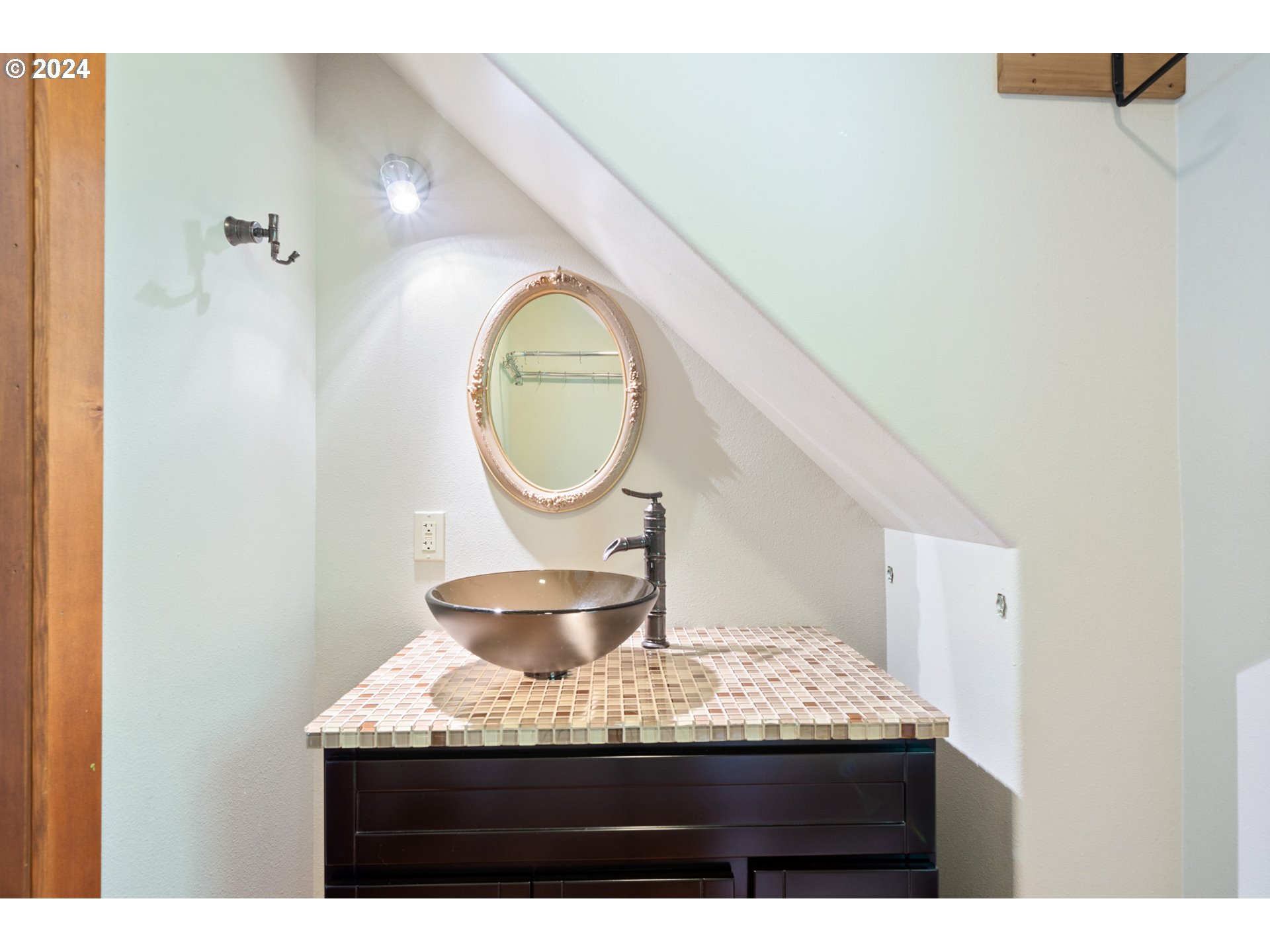 2705 Netarts Bay Drive Netarts, OR 97141 - Photo 43 of 48 a view of a kitchen with a sink and a mirror