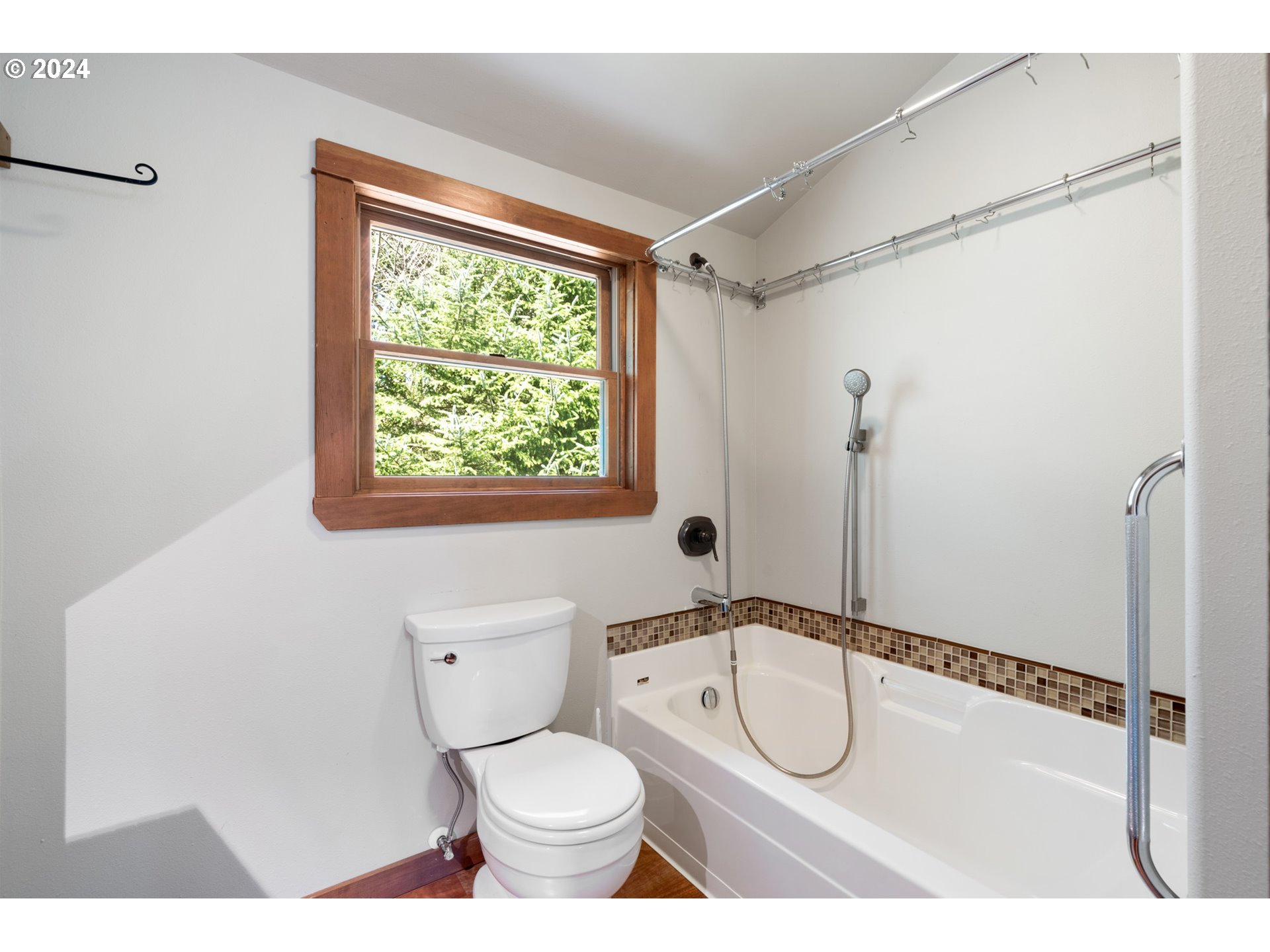 2705 Netarts Bay Drive Netarts, OR 97141 - Photo 44 of 48 a bathroom with a toilet a sink and a shower