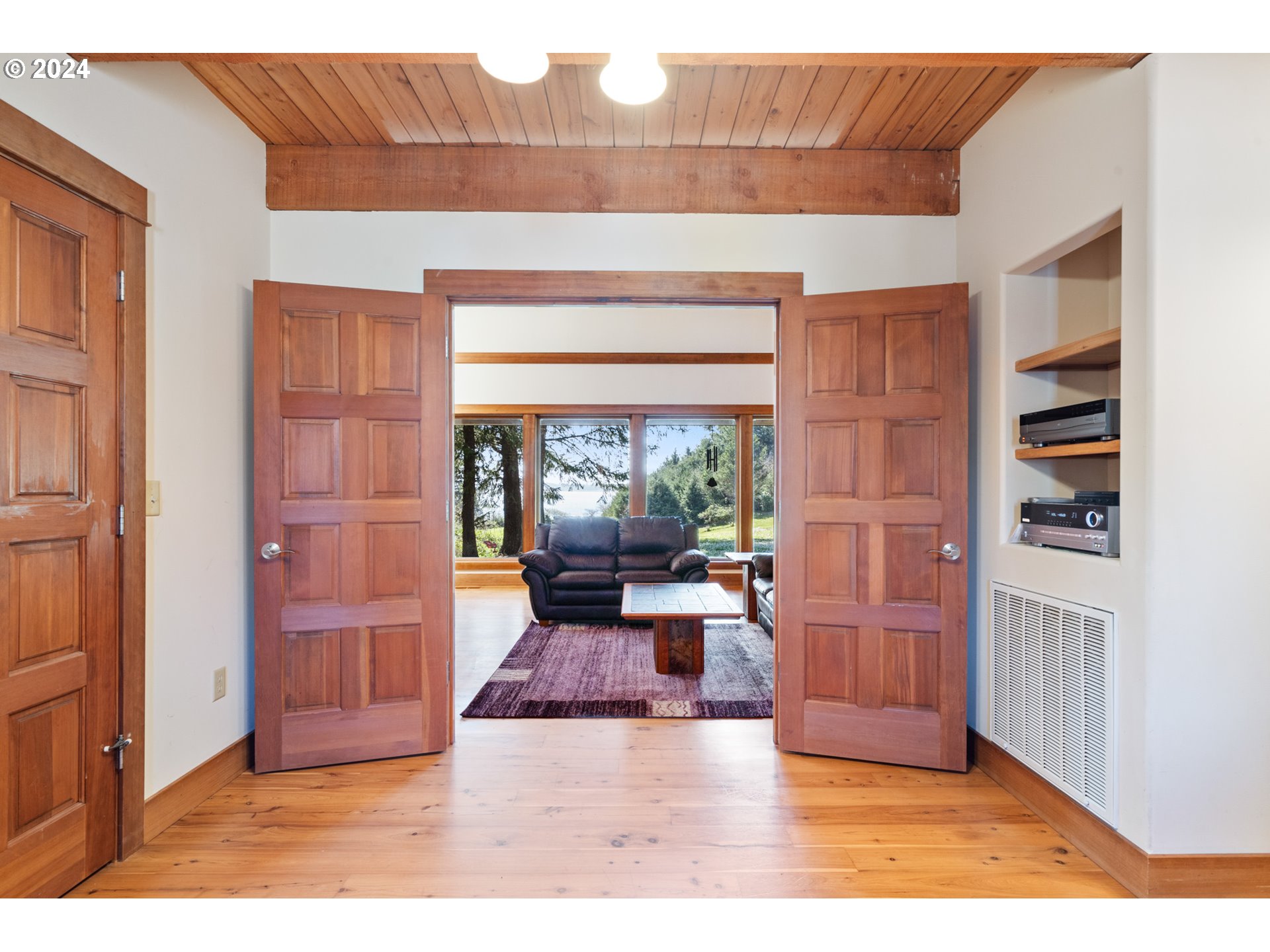 2705 Netarts Bay Drive Netarts, OR 97141 - Photo 7 of 48 a living room with furniture window and wooden floor