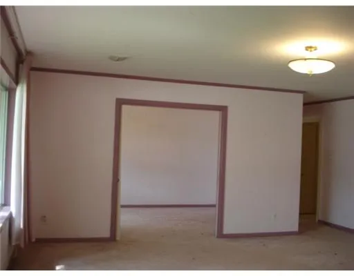 a view of a livingroom with an empty space