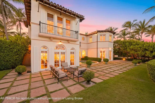 a view of an ocean beach and mountain
