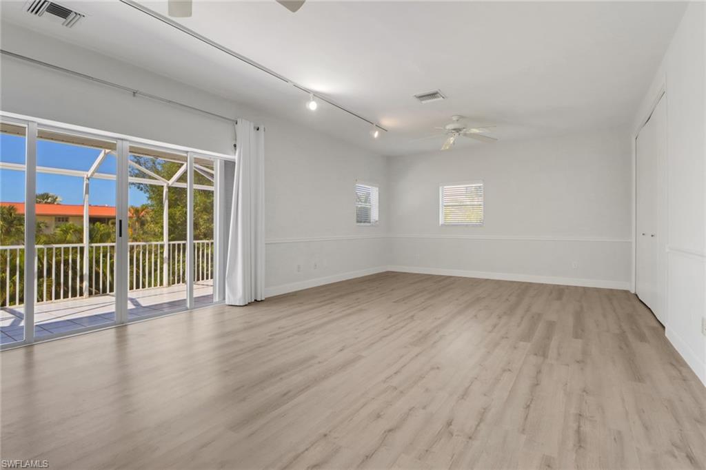 1120 Sandpiper Street Naples, FL 34102 - Photo 9 of 15 Primary Bedroom