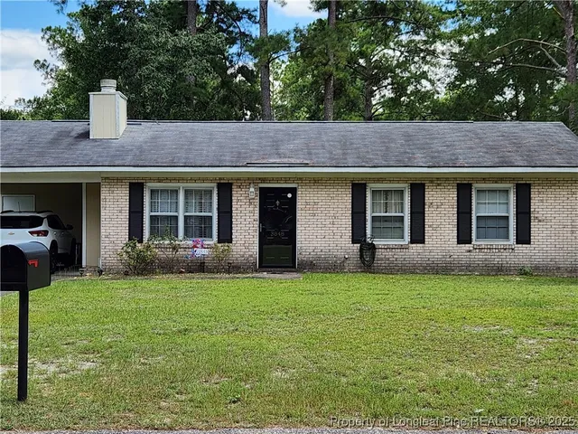 a house view with a garden space