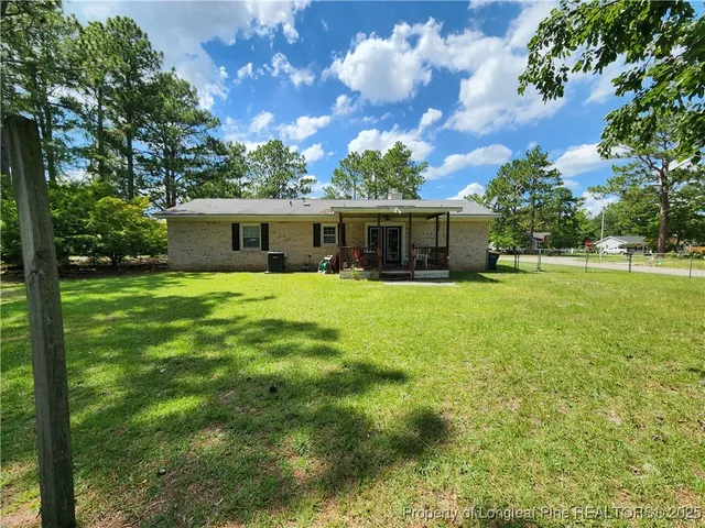 a view of a house with a big yard