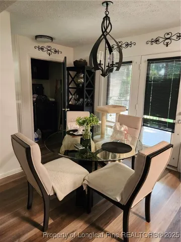a view of a dining room with furniture
