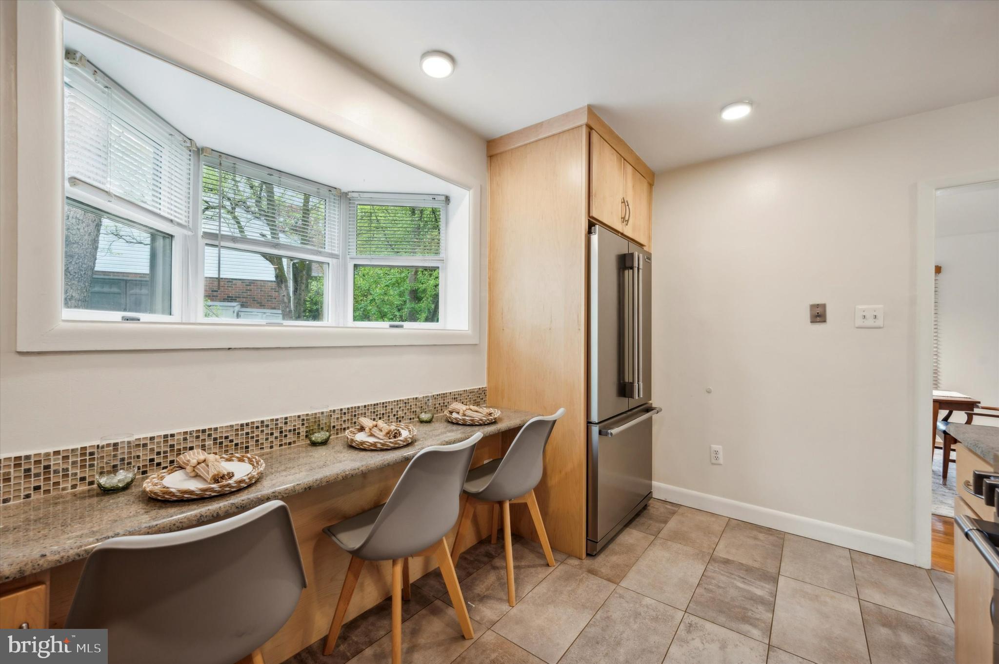 135 Cornell Road Bala Cynwyd, PA 19004 - Photo 15 of 37 a kitchen with stainless steel appliances granite countertop a stove and a refrigerator