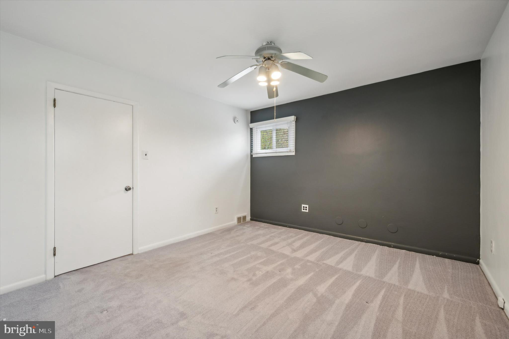 135 Cornell Road Bala Cynwyd, PA 19004 - Photo 22 of 37 a view of an empty room with a chandelier fan