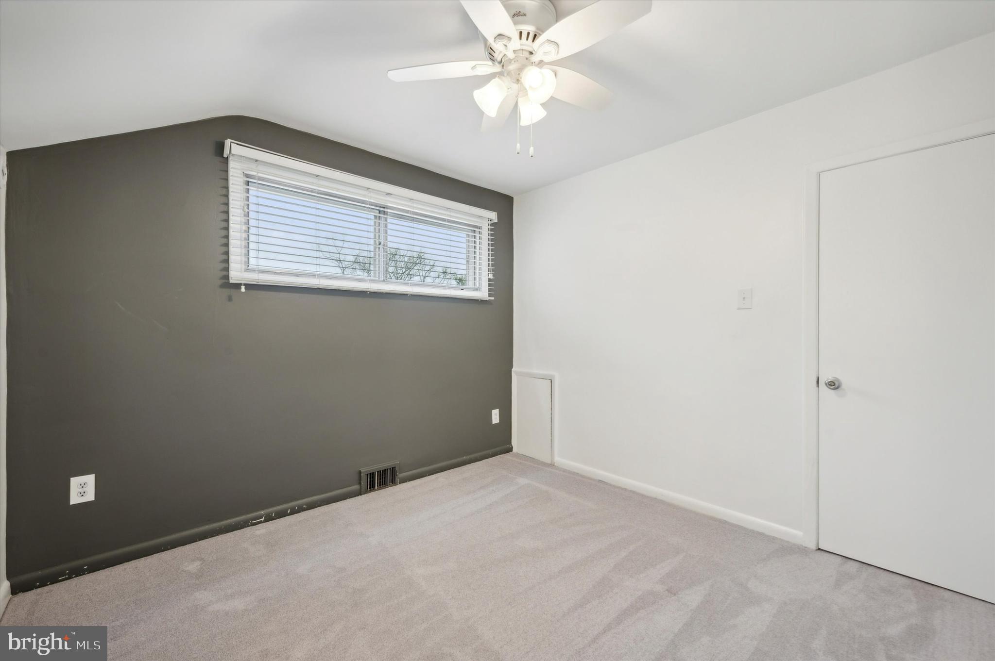 135 Cornell Road Bala Cynwyd, PA 19004 - Photo 23 of 37 an empty room with a window and a fan