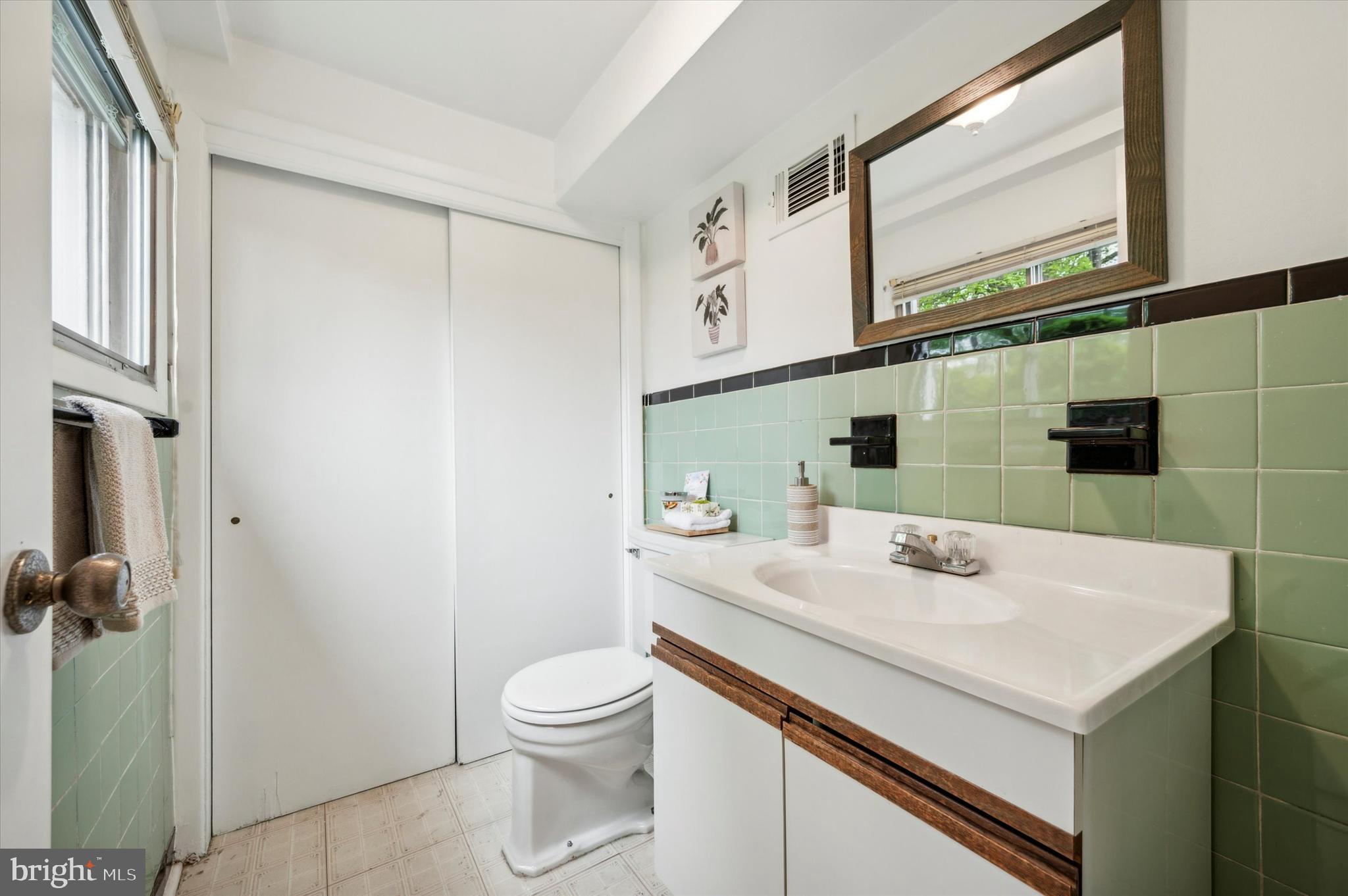 135 Cornell Road Bala Cynwyd, PA 19004 - Photo 27 of 37 a bathroom with a sink a toilet and a mirror