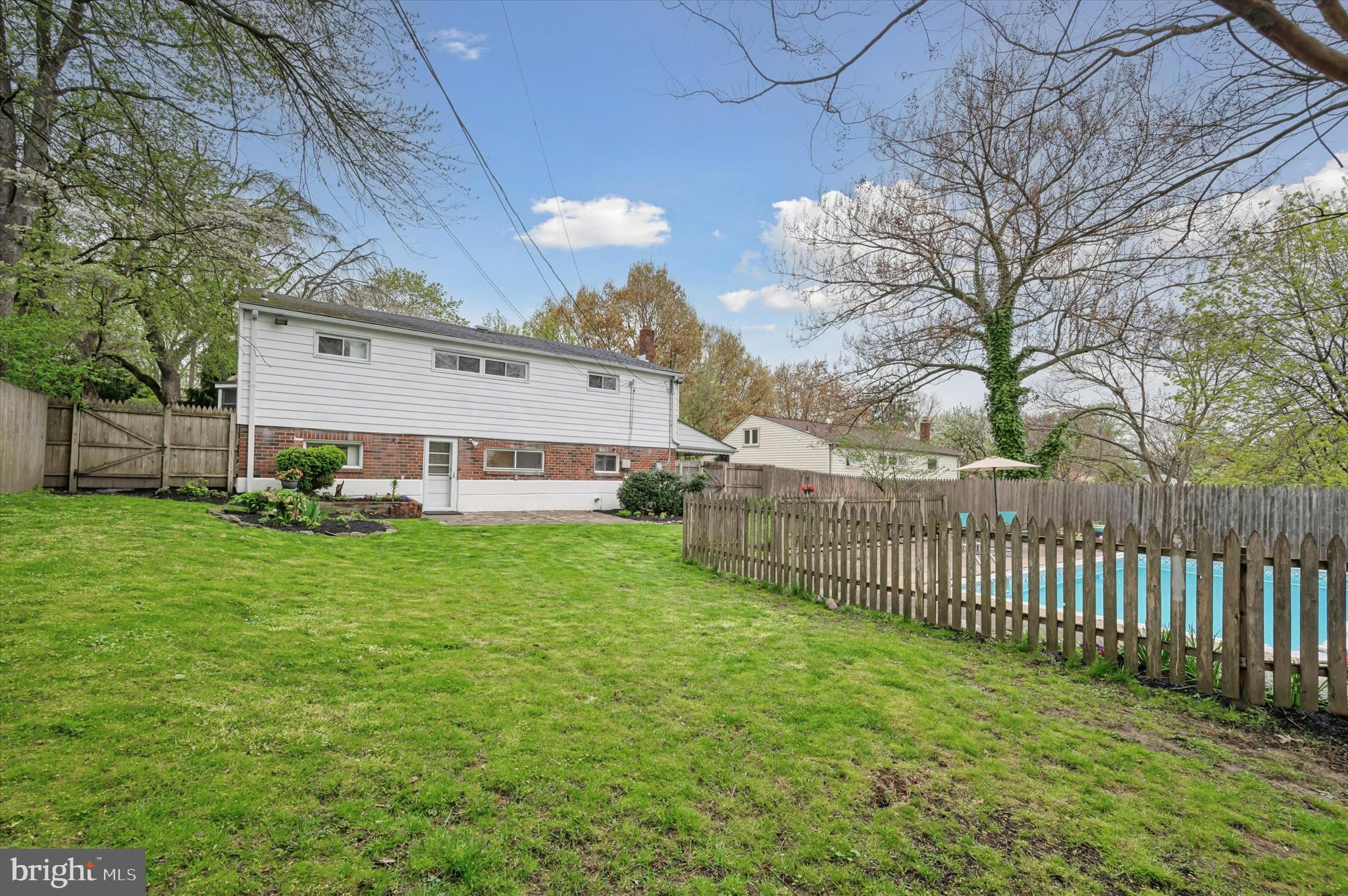 135 Cornell Road Bala Cynwyd, PA 19004 - Photo 32 of 37 a view of a house with a yard and deck