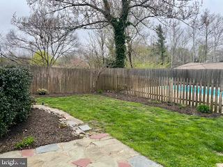 135 Cornell Road Bala Cynwyd, PA 19004 - Photo 34 of 37 a view of a backyard with a small cabin