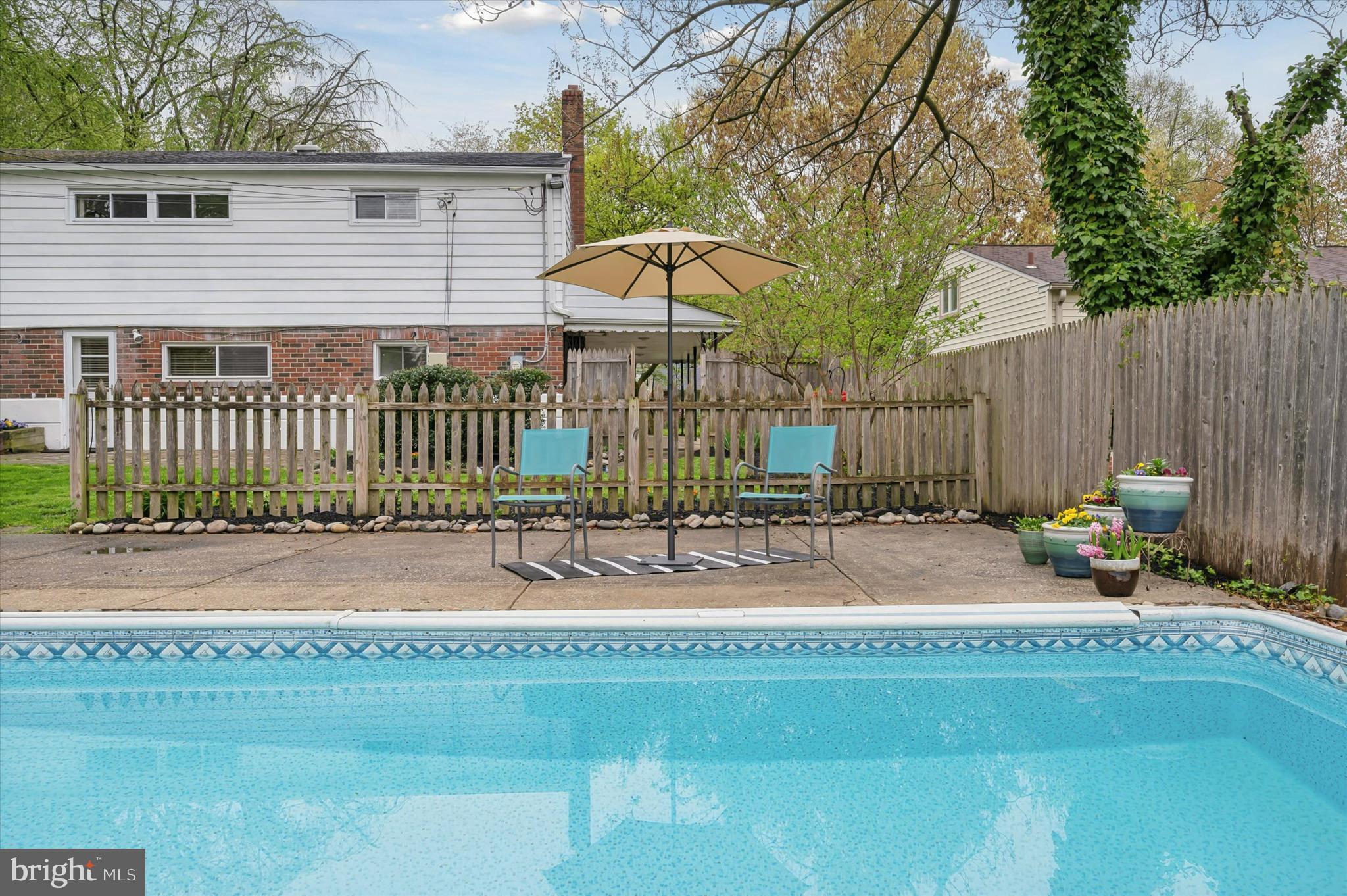 135 Cornell Road Bala Cynwyd, PA 19004 - Photo 36 of 37 a view of a house with a small pool and furniture