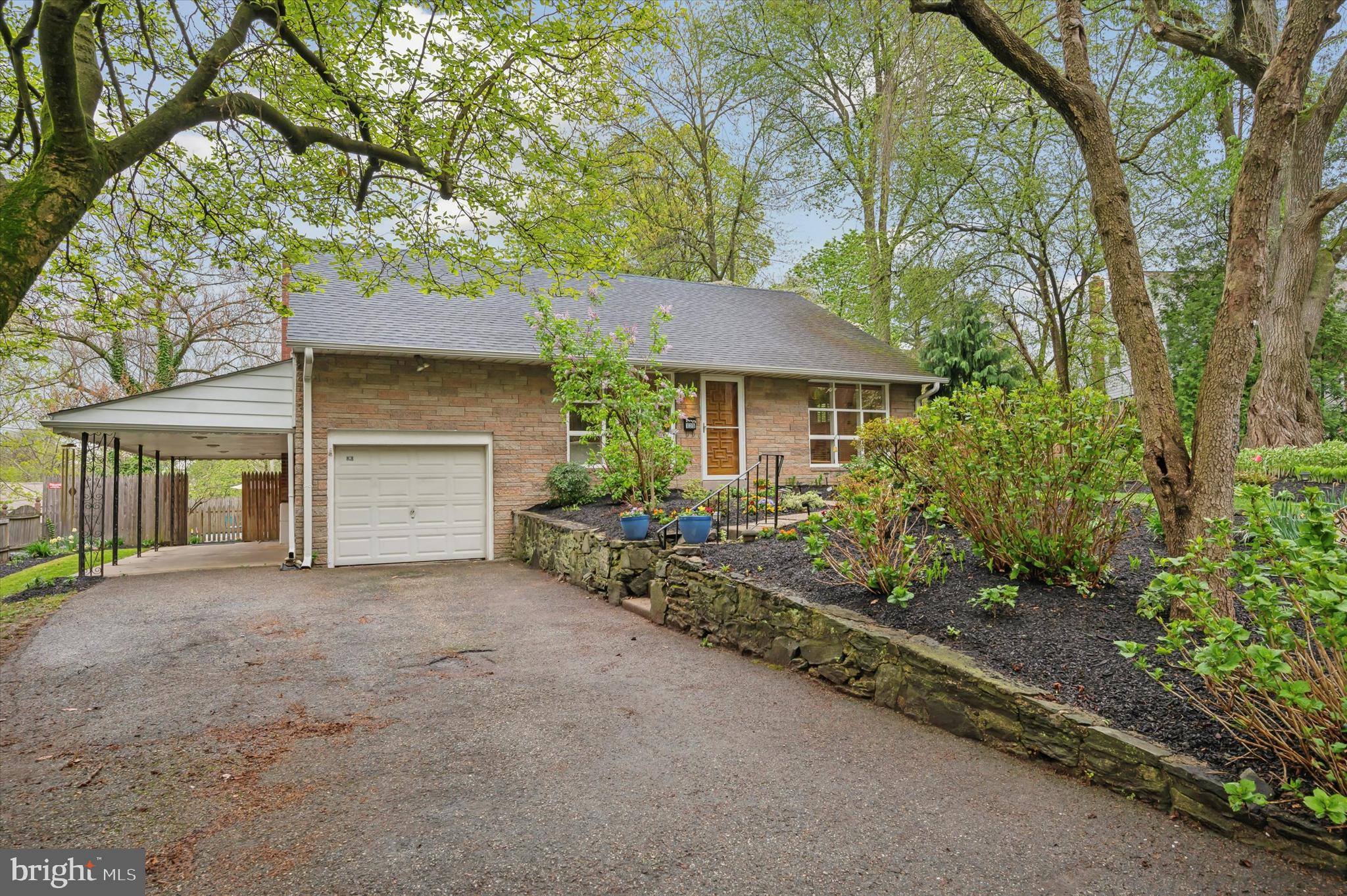 135 Cornell Road Bala Cynwyd, PA 19004 - Photo 5 of 37 a front view of a house with a garden