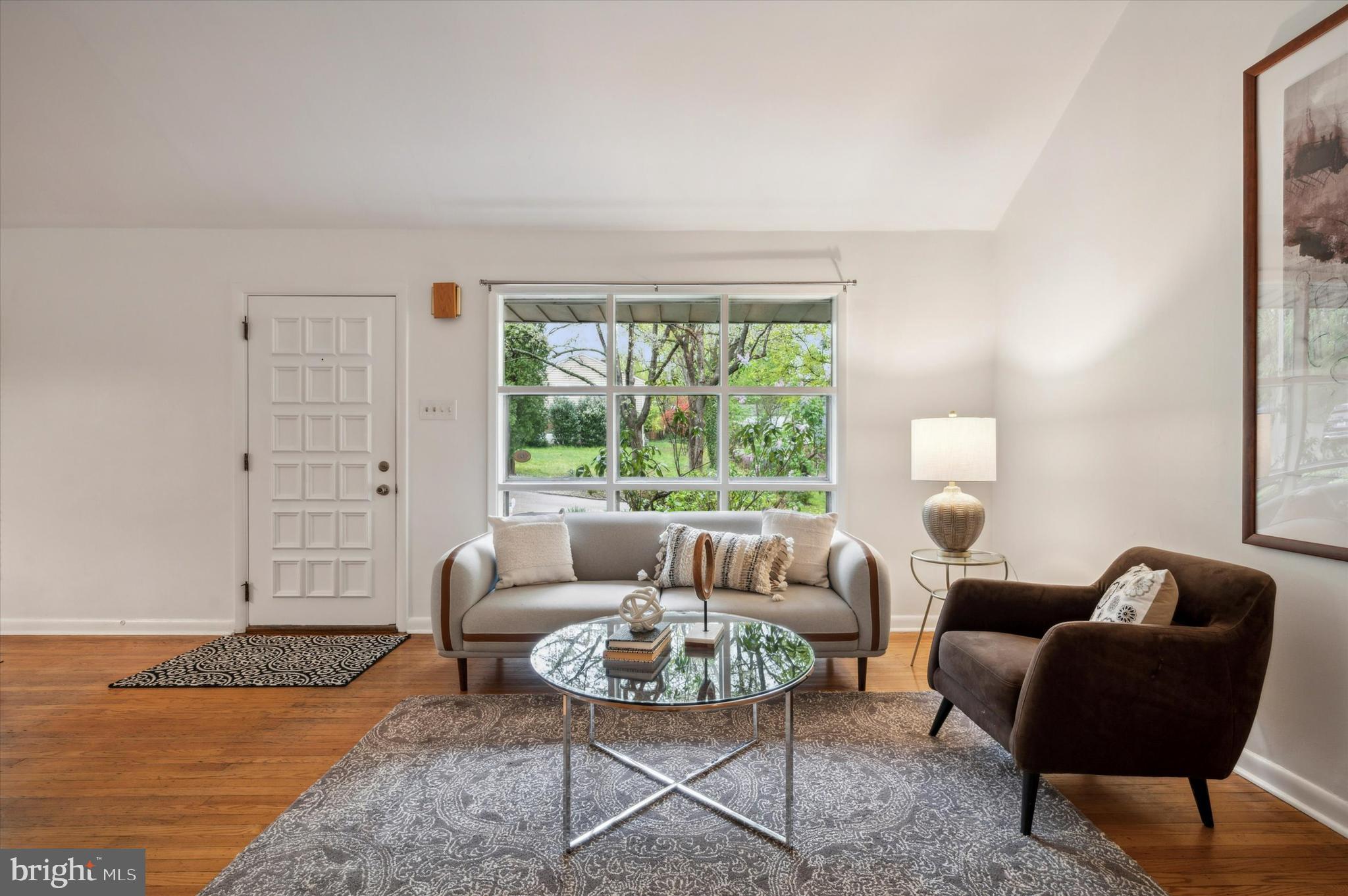 135 Cornell Road Bala Cynwyd, PA 19004 - Photo 8 of 37 a living room with furniture and a large window