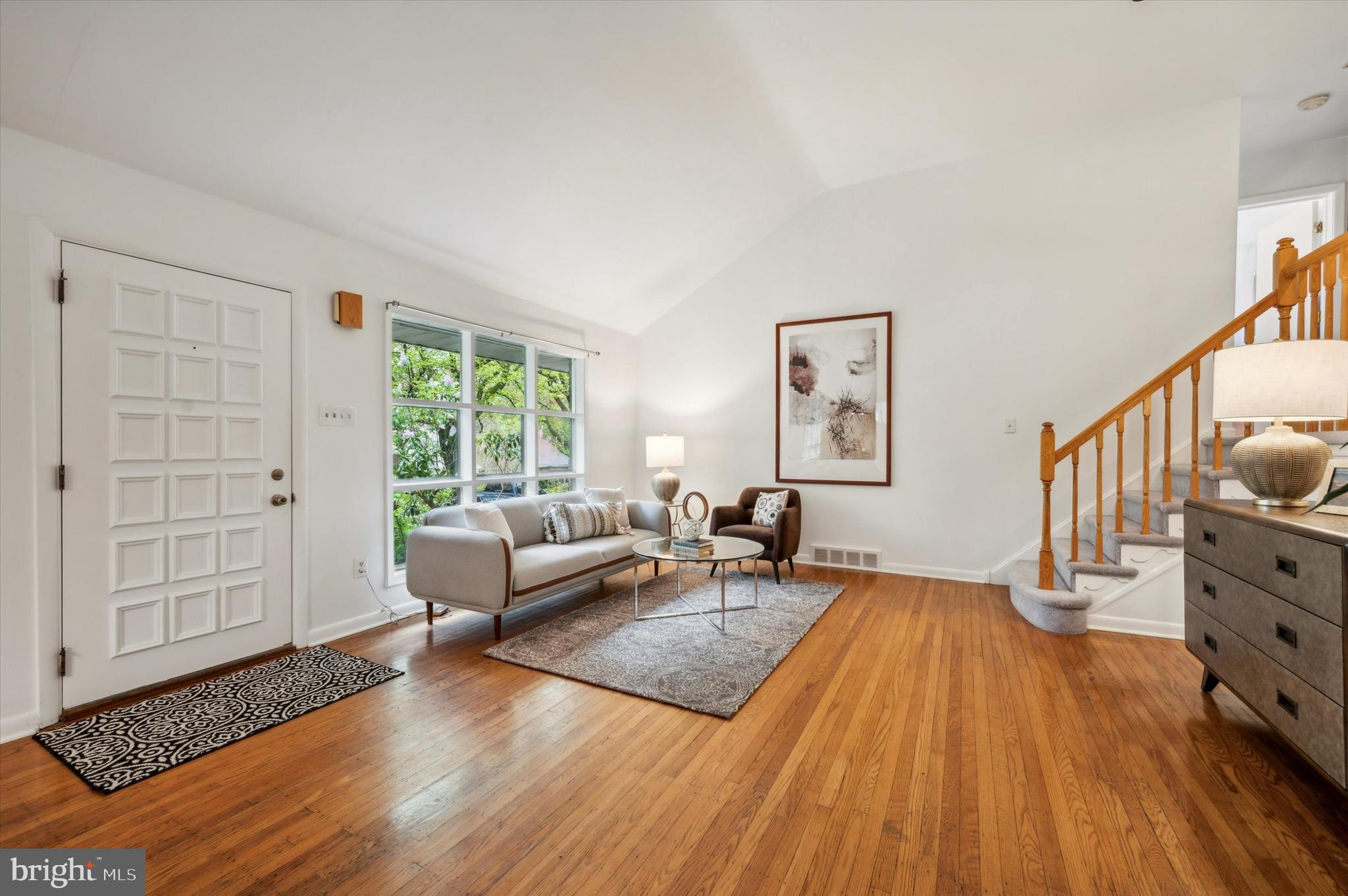 135 Cornell Road Bala Cynwyd, PA 19004 - Photo 9 of 37 a living room with furniture and a wooden floor
