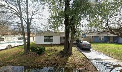 a house view with a garden space
