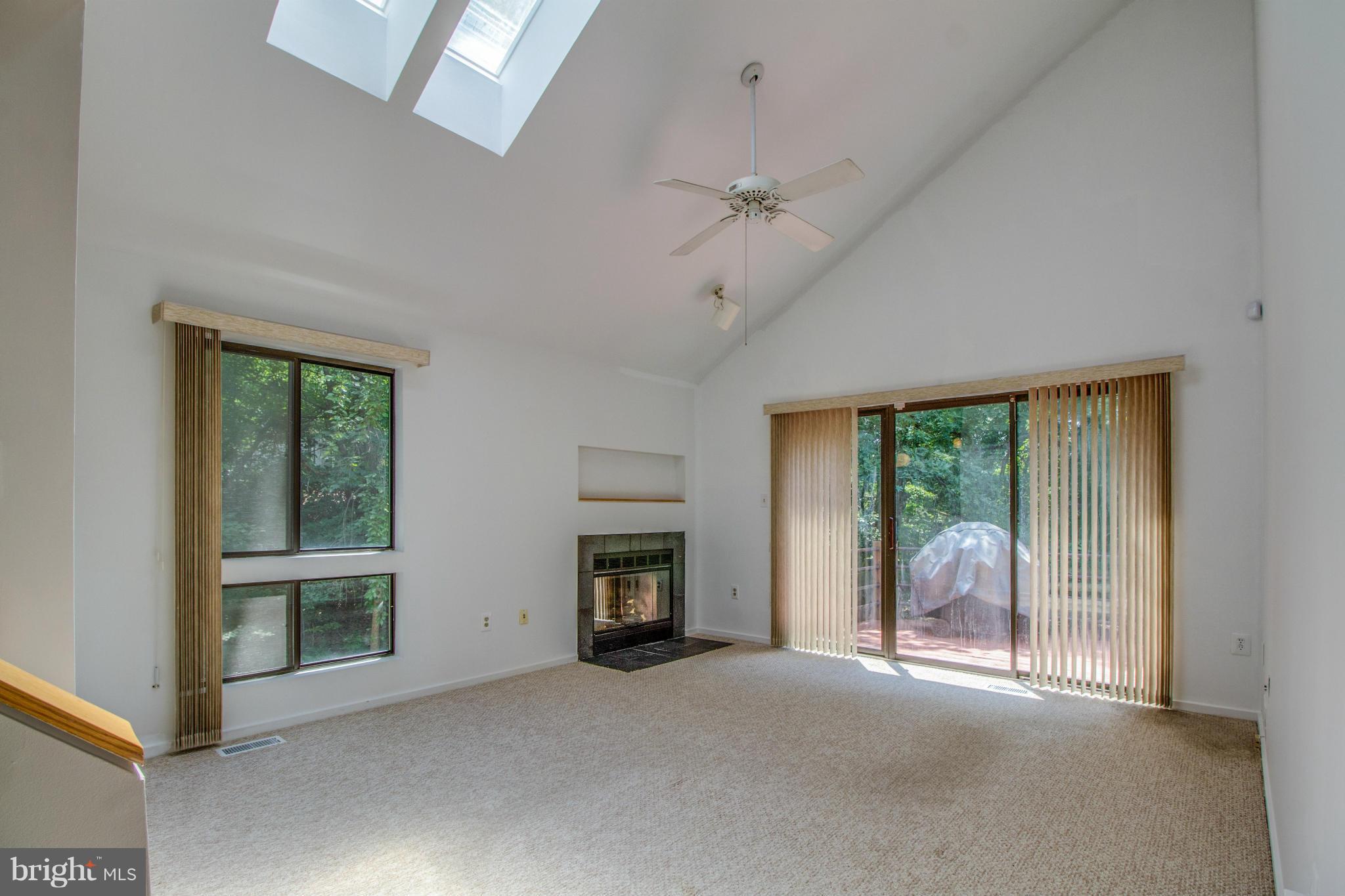 1673 Cedar Hollow Way Reston, VA 20194 - Photo 7 of 30 Family Room w/ Sliding Door to Deck