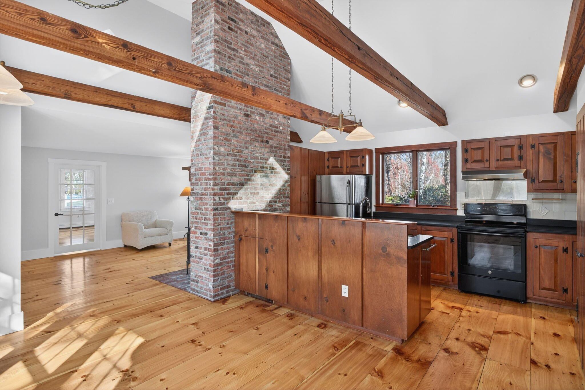 14 Bambi Way Orleans, MA 02653 - Photo 19 of 59 a view of living room kitchen and entryway