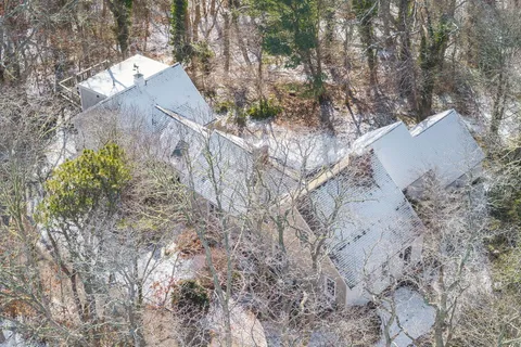 a view of houses and yard