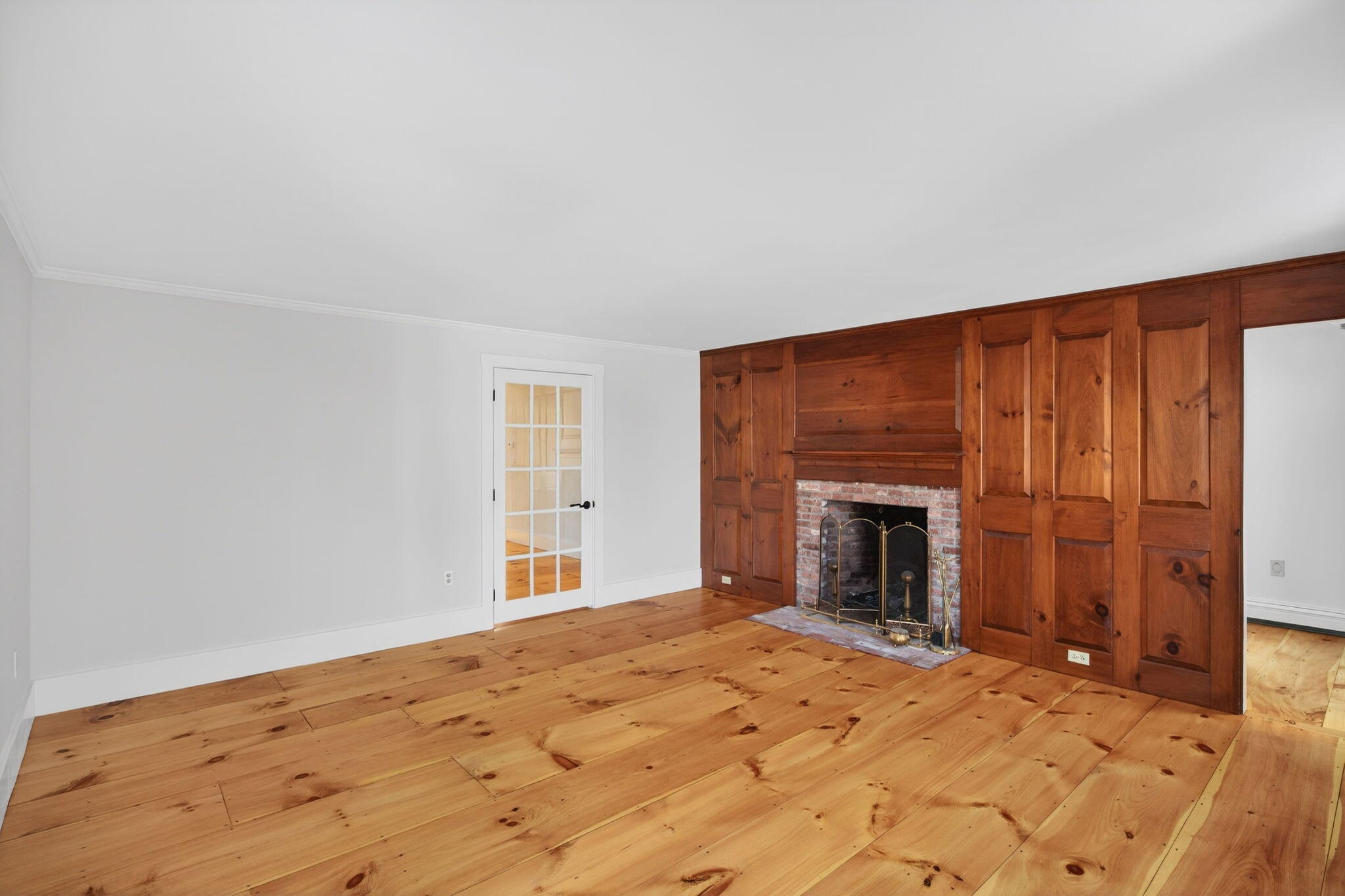 14 Bambi Way Orleans, MA 02653 - Photo 23 of 59 a bedroom with a bed and a fireplace