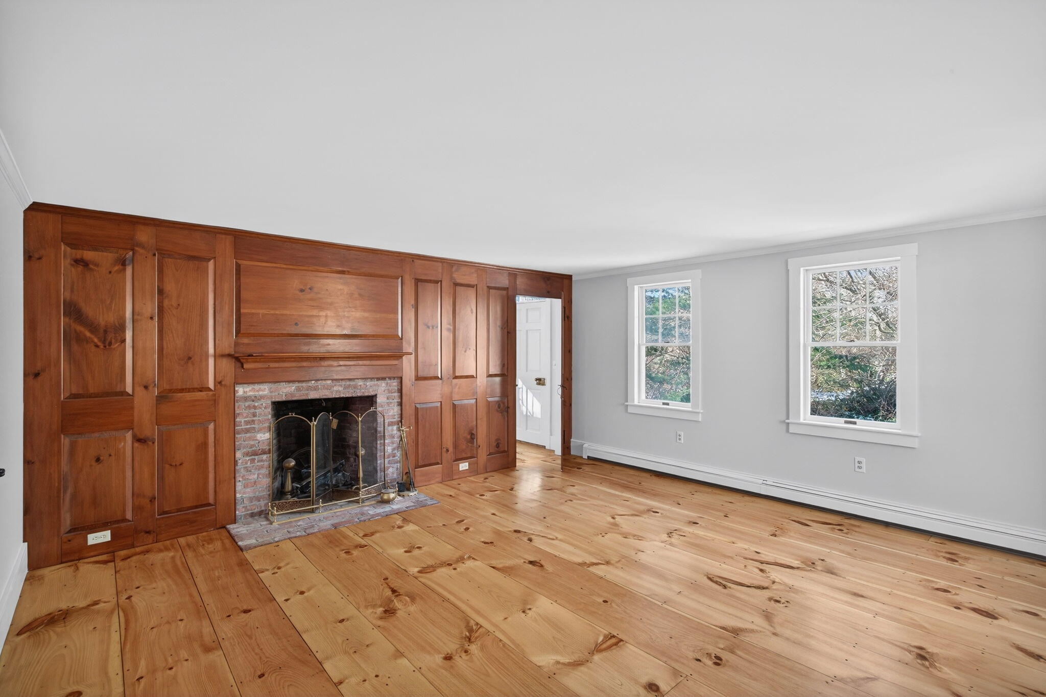 14 Bambi Way Orleans, MA 02653 - Photo 24 of 59 an empty room with windows and fireplace