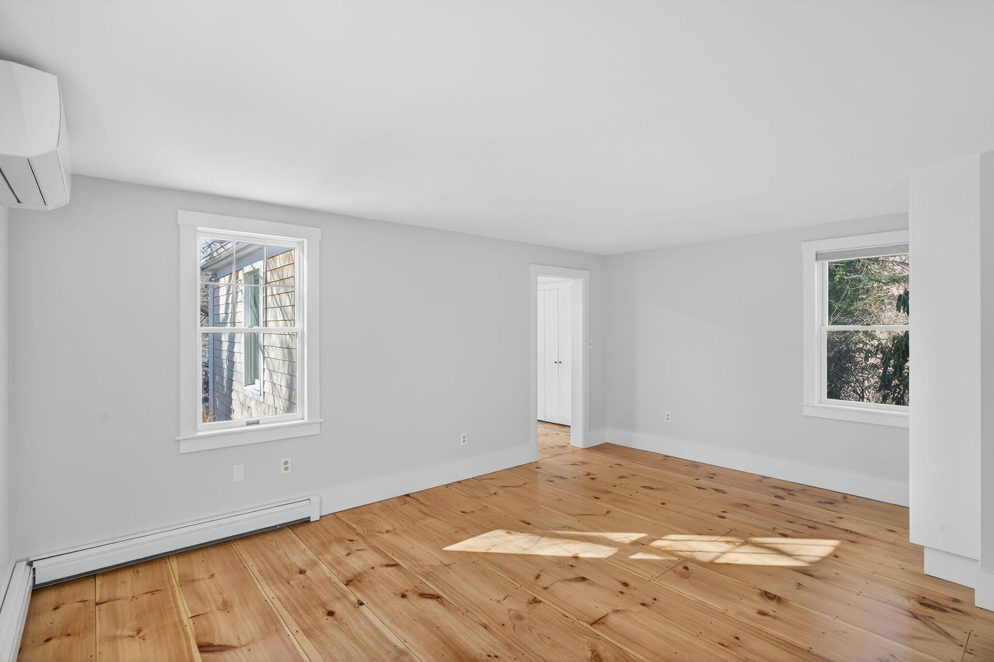 14 Bambi Way Orleans, MA 02653 - Photo 32 of 59 a view of empty room with wooden floor and fan