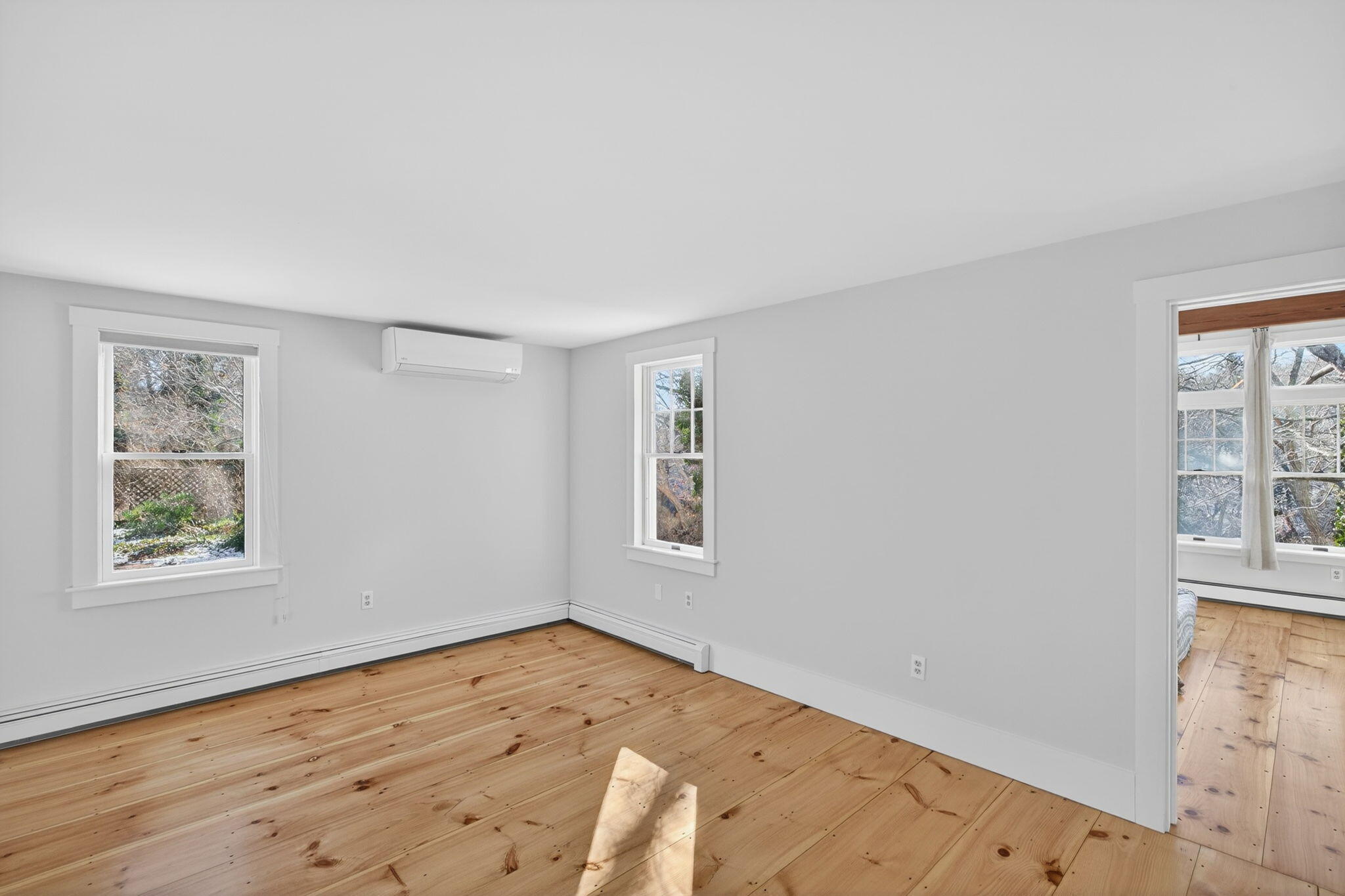 14 Bambi Way Orleans, MA 02653 - Photo 33 of 59 wooden floor in an empty room with a window