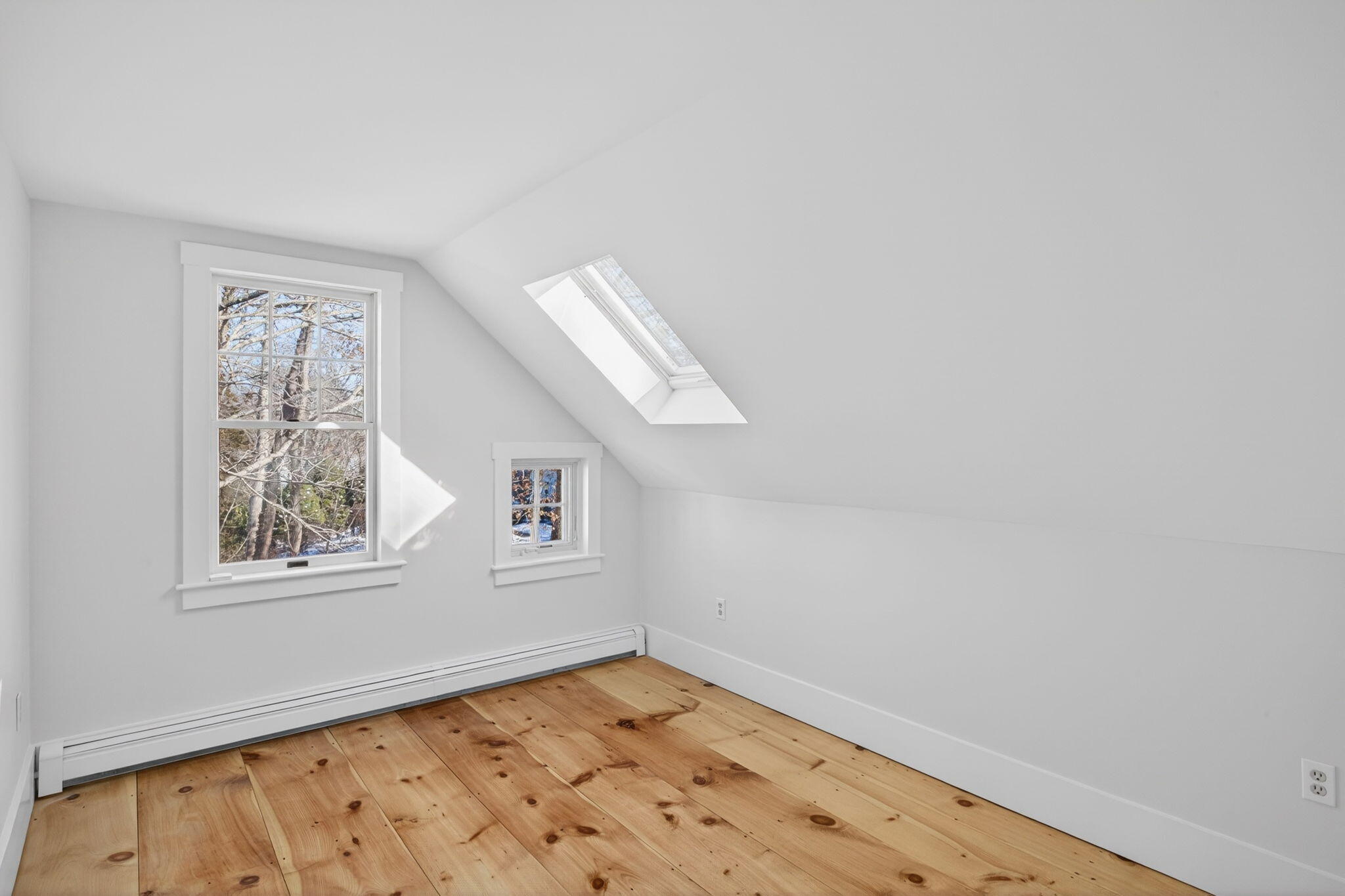 14 Bambi Way Orleans, MA 02653 - Photo 46 of 59 an empty room with wooden floor and windows